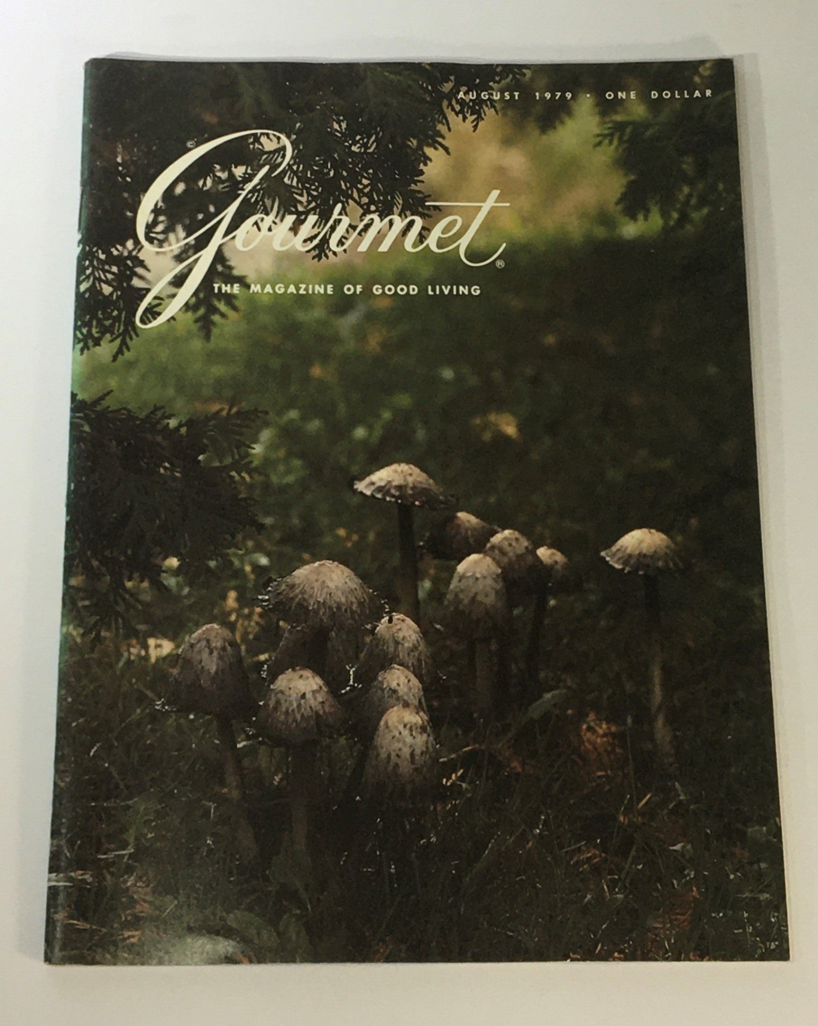Cover of VTG Gourmet Magazine August 1979, featuring a serene forest scene with mushrooms, highlighting the theme of good living.