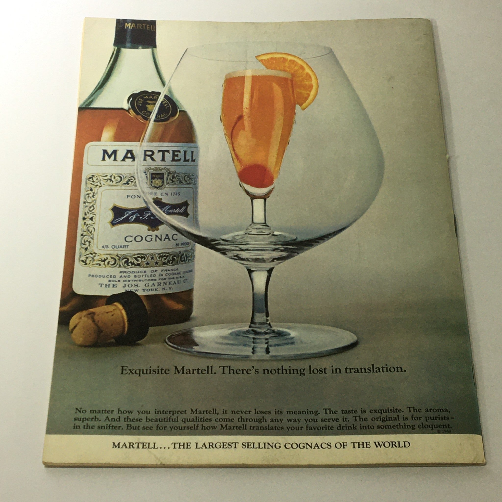 Back cover of VTG Gourmet The Magazine of Good Living February 1971, featuring a Martell Cognac advertisement with a luxurious glass of drink, emphasizing elegance and gourmet living.