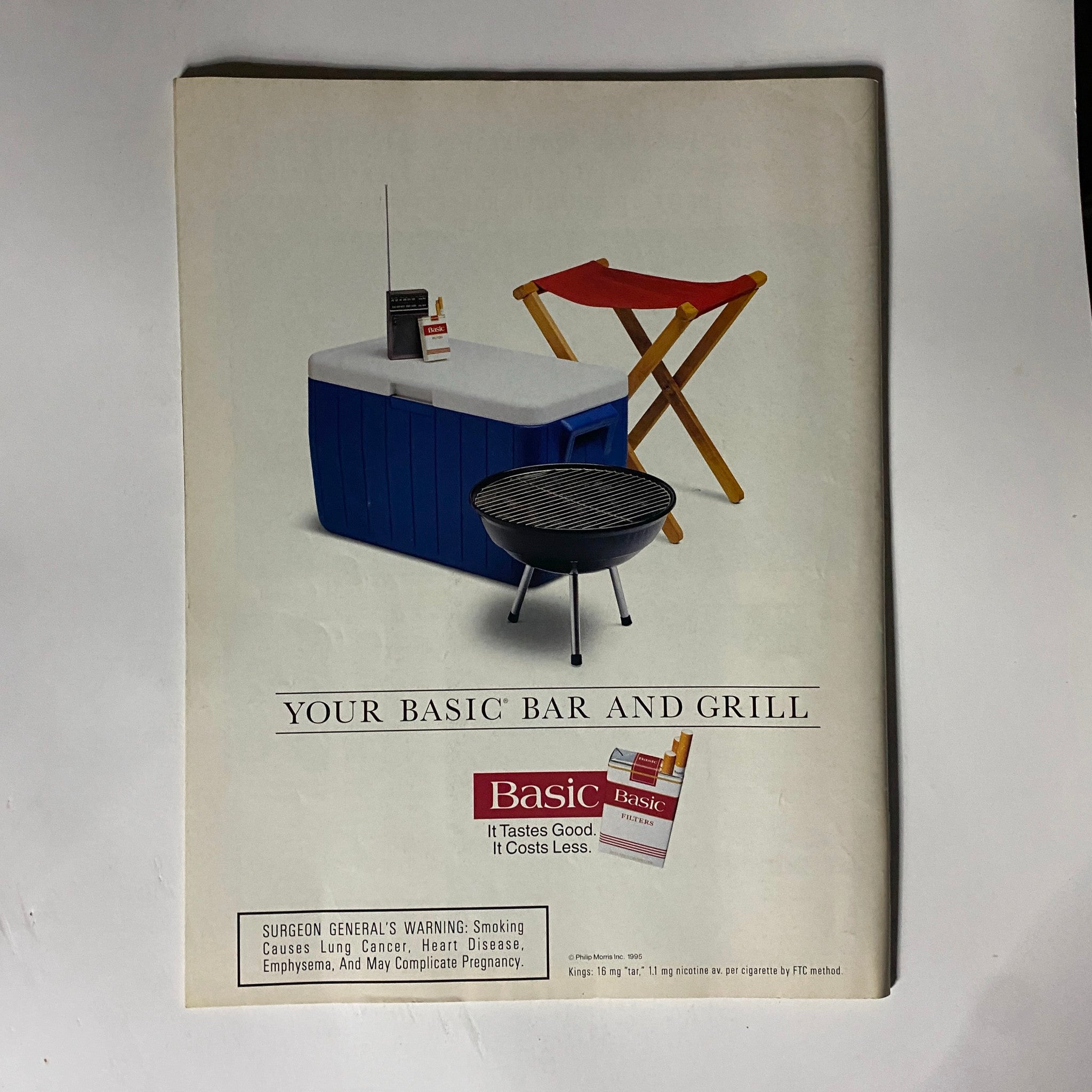 Advert from People Weekly Magazine October 9, 1995 showcasing a basic bar and grill, advertising Basic cigarettes, highlighting a quintessential 90s lifestyle.