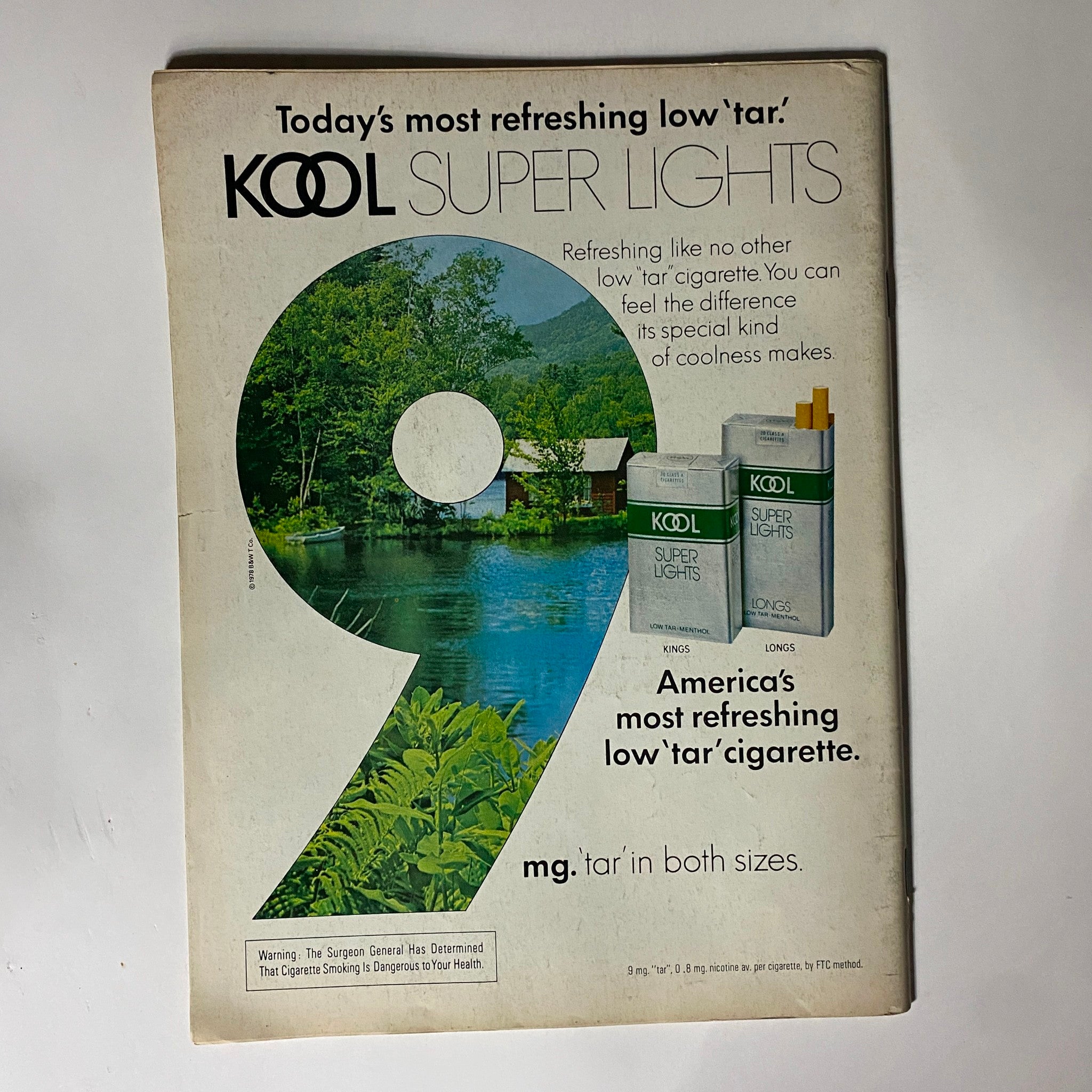 Back cover advertisement of VTG People Weekly Magazine March 27, 1978, showcasing KOOL Super Lights cigarettes with a scenic view of nature and a compelling message.