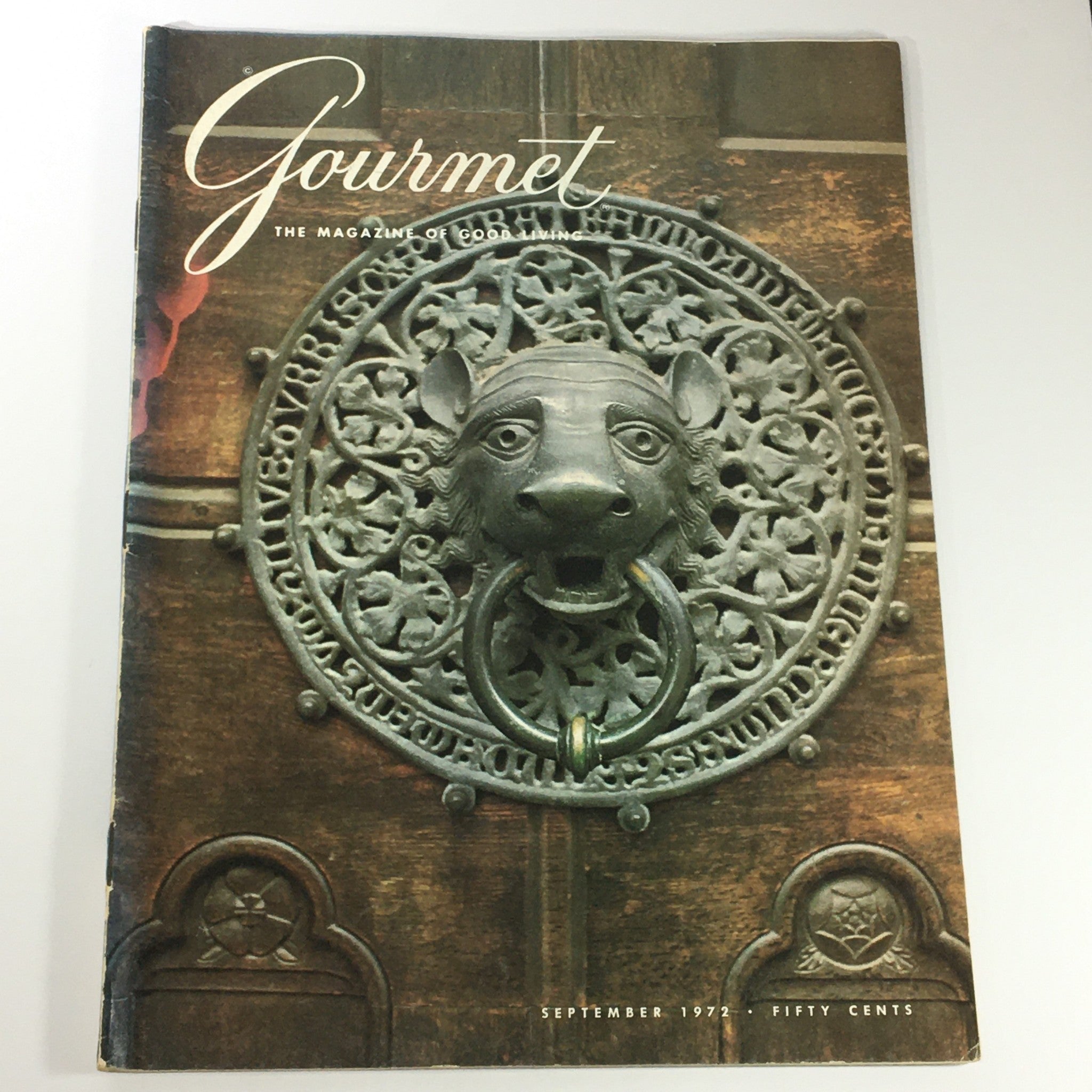 Cover of VTG Gourmet: The Magazine of Good Living September 1972 featuring a lion's head door knocker design, highlighting the theme 'The Cheese Blues'.
