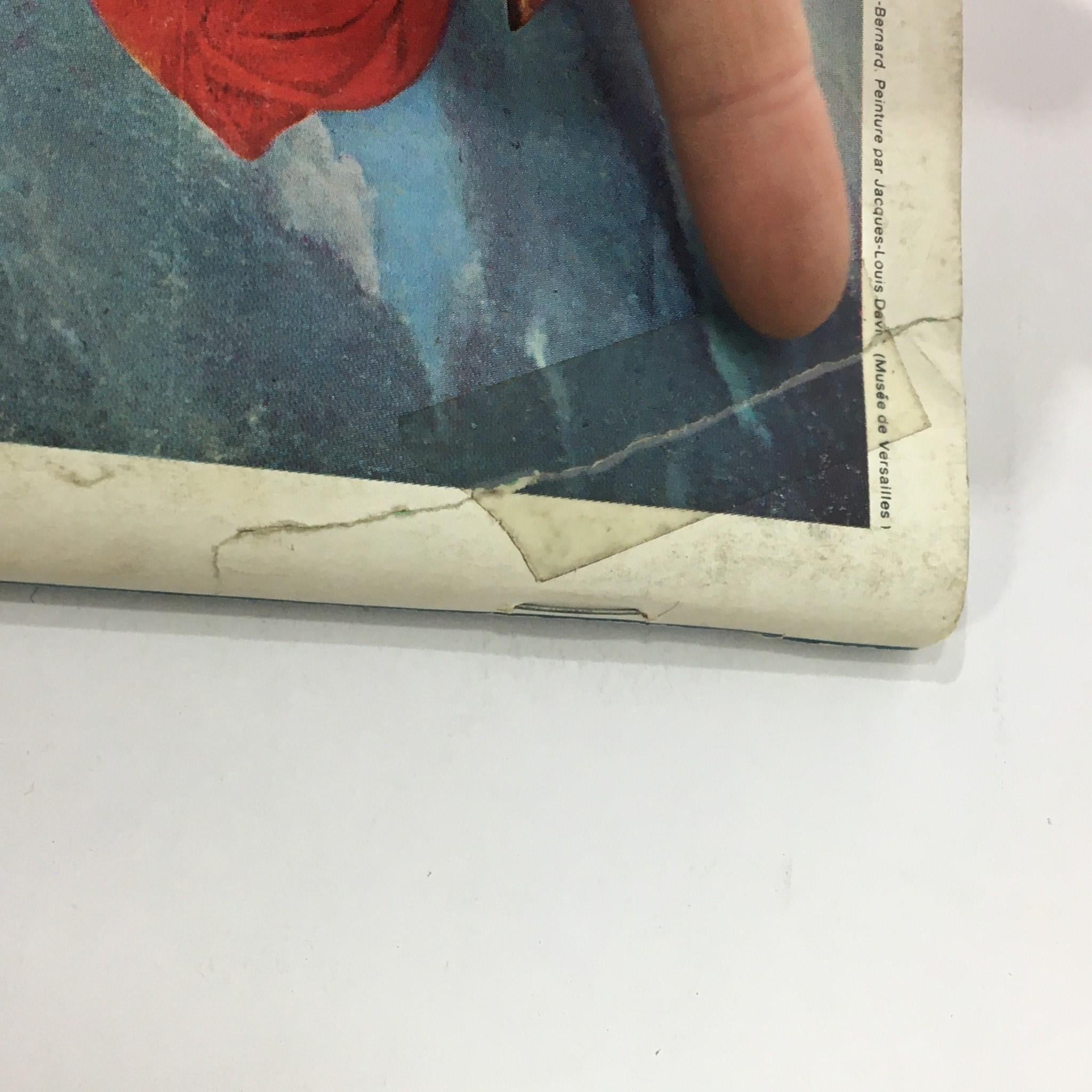 Detail of the back cover of VTG Gourmet The Magazine of Good Living November 1974, highlighting the intricate artwork of Napoleon and the damaged edge of the magazine.