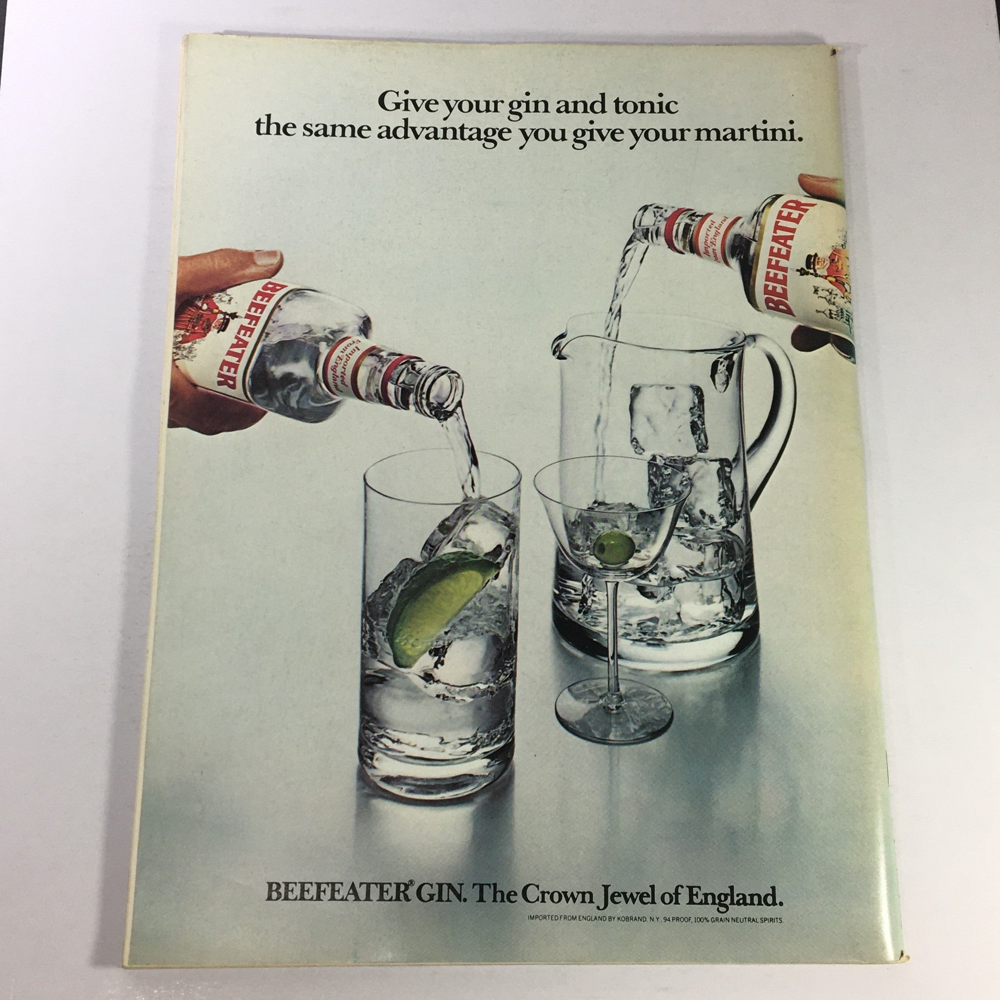 Back cover of VTG Gourmet The Magazine of Good Living June 1979, featuring a vintage advertisement for Beefeater Gin, illustrating the pouring of gin into glasses with ice and lime, highlighting cocktail culture.