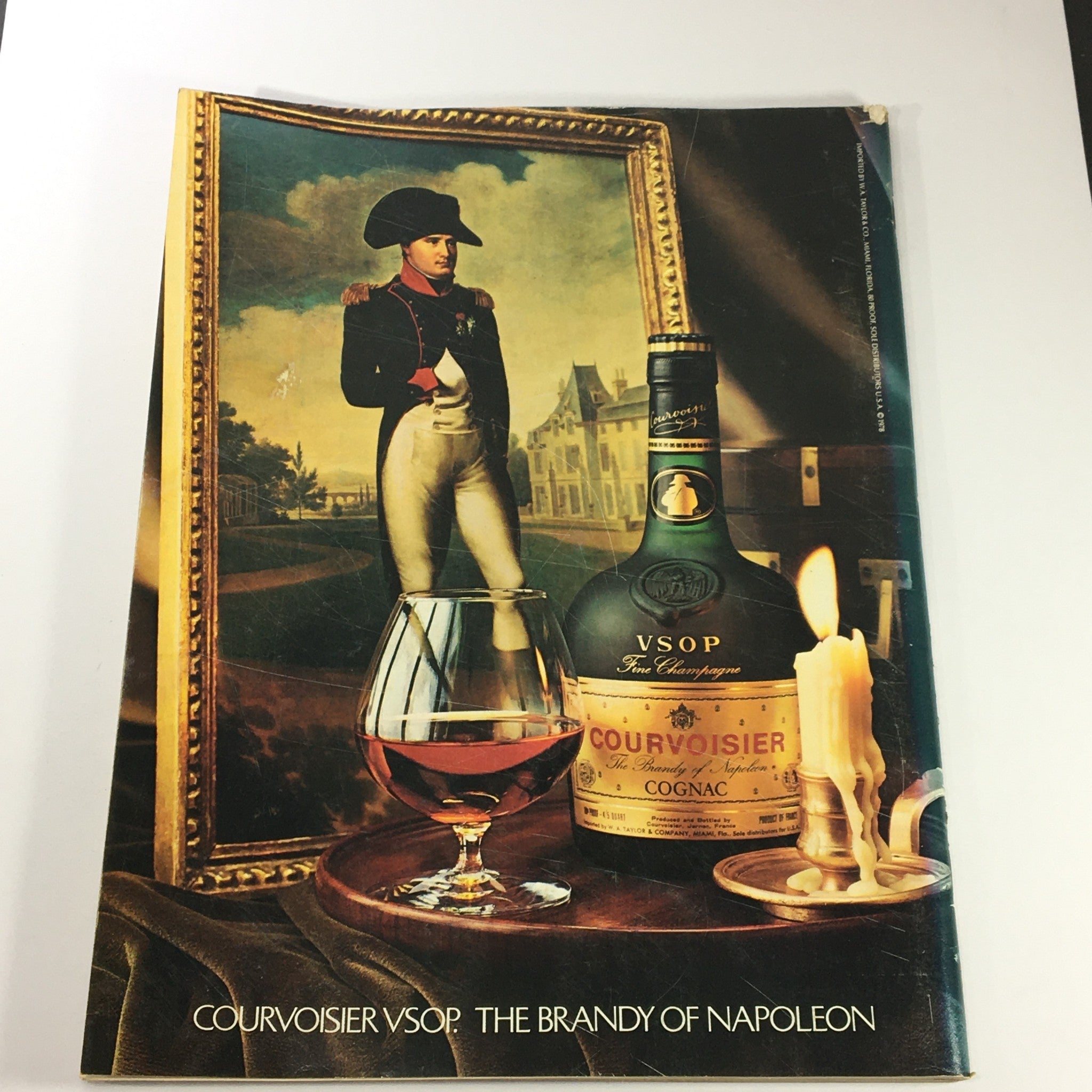 Cover image of VTG Gourmet The Magazine of Good Living, November 1978, featuring an artistic depiction of a bottle of Courvoisier VSOP cognac alongside a glass of cognac and a candle, with a portrait of a historical figure in the background.