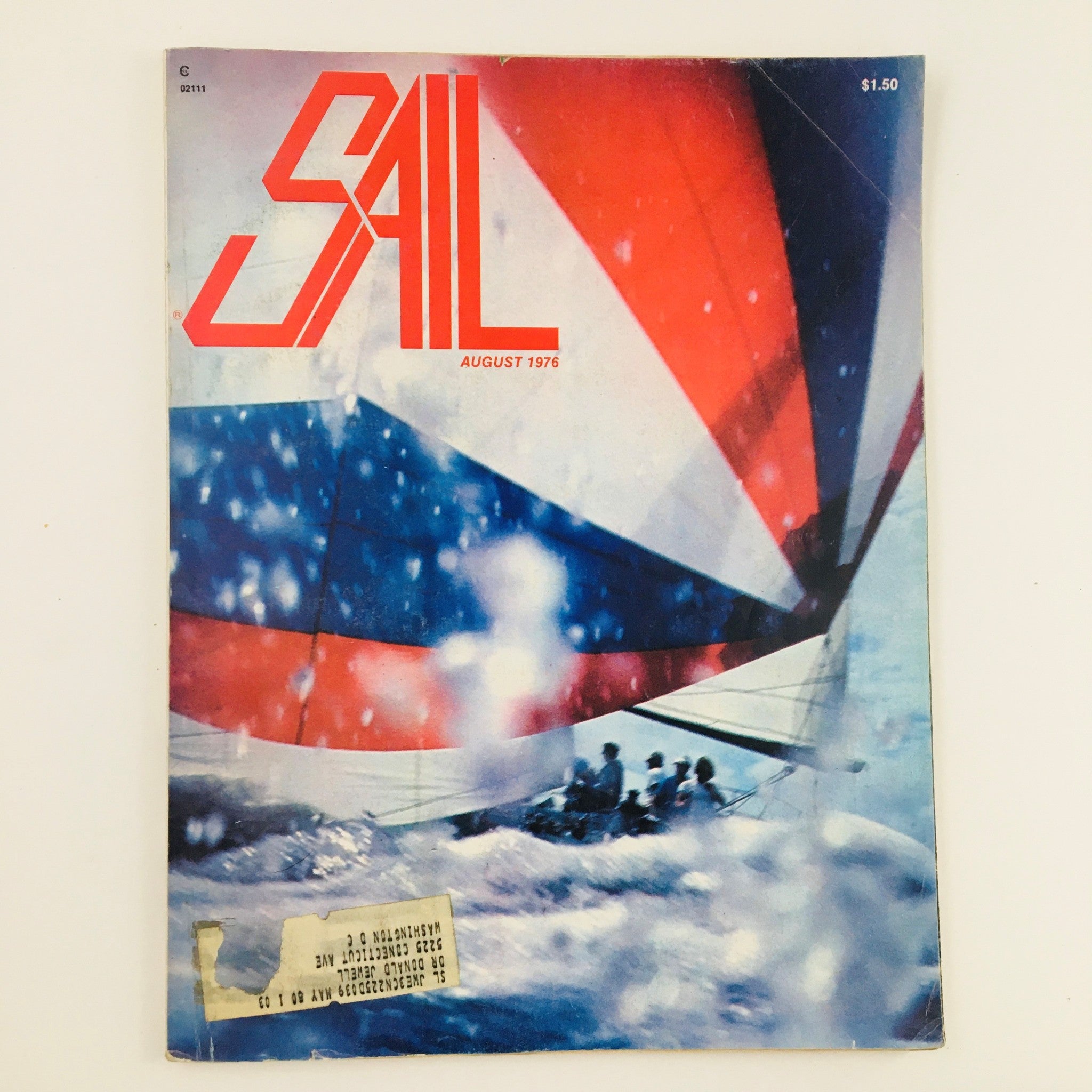 Cover of Sail Magazine August 1976 featuring the title 'The Unmaking of a Racing Sailor' by Mimi Dyer, showcasing a vibrant image of sailors on a boat with colorful sails amid water and splashes.