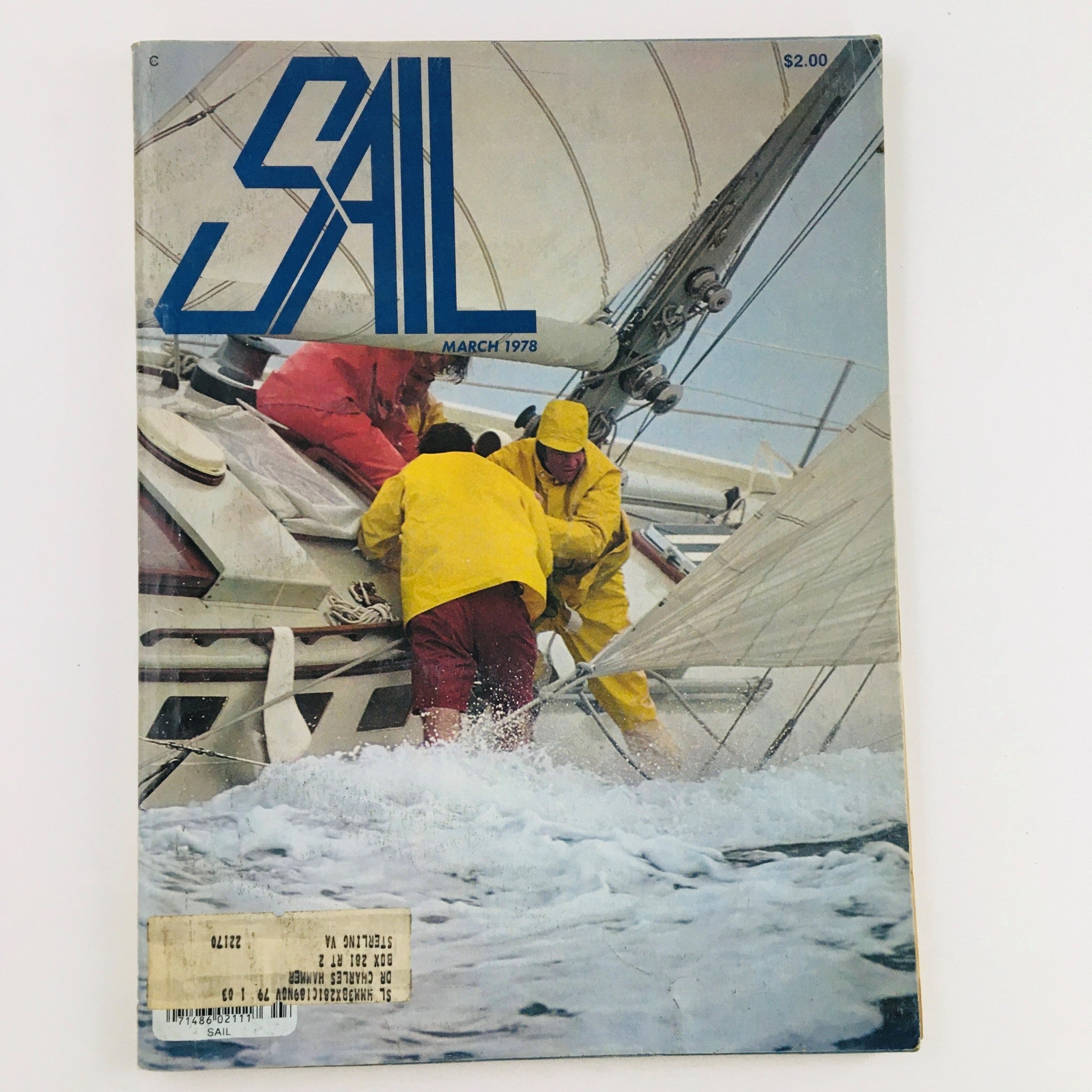 Sail Magazine March 1978 cover featuring sailors in yellow rain gear engaging in rail-down action aboard a yacht during a sailing maneuver.