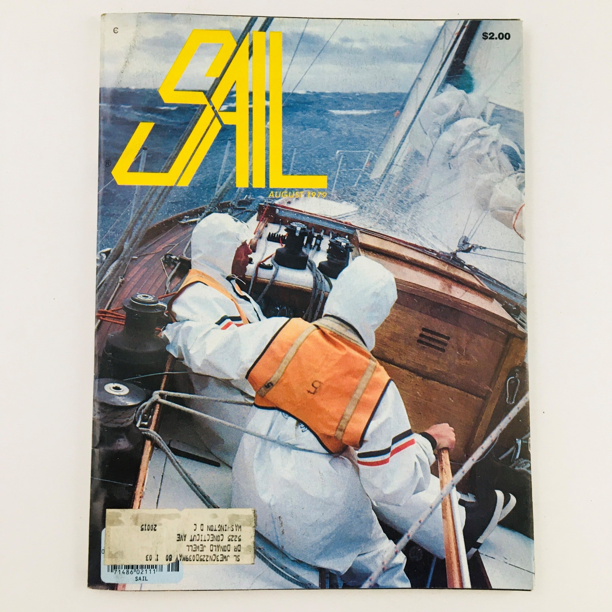Sail Magazine August 1979 cover featuring two sailors in waterproof gear navigating a boat through rough waters, emphasizing water as the sailor's most important store.