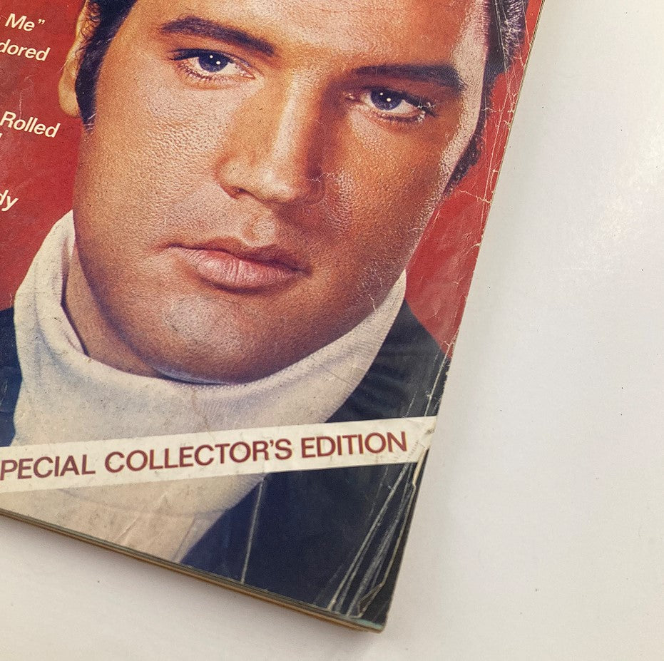Detailed view of the cover of VTG Photoplay Magazine 1977 featuring Elvis Presley. The title 'A Photoplay Tribute' is prominently displayed with an image of Elvis showcasing his captivating expression.