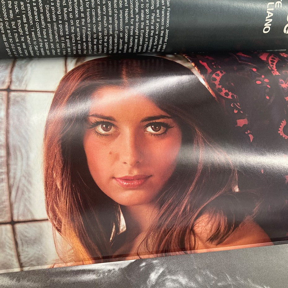 Inside page of the Vintage 1971 Playboy Express Magazine featuring a captivating image of a woman, highlighting the artistic photography and cultural essence of the era.