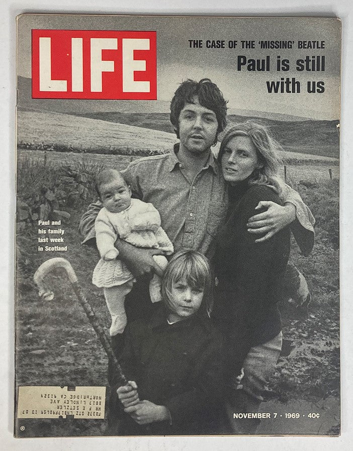 Cover of Life Magazine, November 7, 1969, featuring Paul McCartney and family with the headline 'Paul is still with us.' This vintage issue captures a moment in history during the late 1960s.