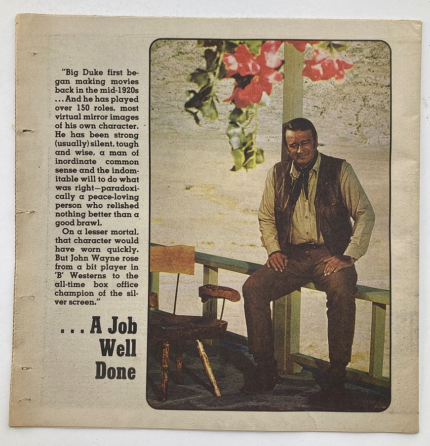 Inside page of the VTG 1979 Modern People Newspaper Magazine, highlighting John Wayne with a reflective commentary on his film career, titled 'A Job Well Done', with Wayne sitting on a chair surrounded by flowers.