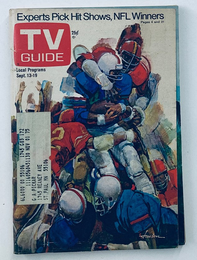 Cover of TV Guide Magazine dated September 13, 1975, featuring NFL winners and a vibrant illustration of football players in action. The magazine highlights the Minneapolis-St. Paul region, showcasing the excitement of the 1975 NFL season.