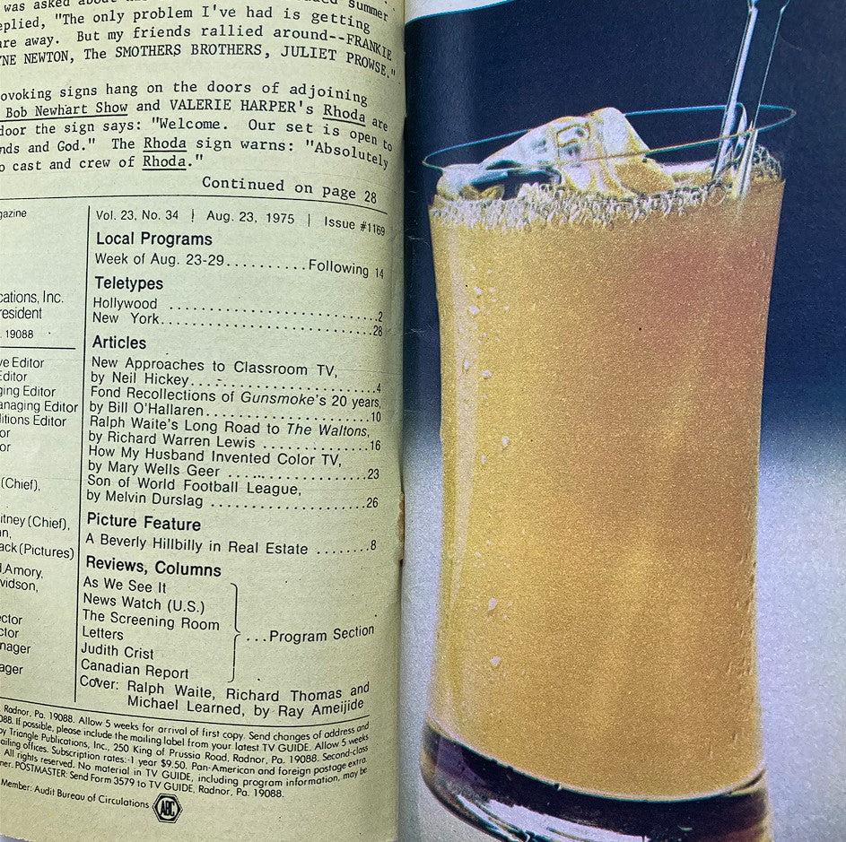 Interior page of TV Guide Magazine August 23 1975, featuring an image of a refreshing drink, alongside listings and articles including insights into 1970s television, as well as a feature on Ralph Waite and Richard Thomas.