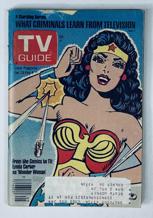 Cover of TV Guide Magazine from January 29, 1977, featuring Lynda Carter as Wonder Woman. This Oregon State edition showcases vibrant comic-style artwork and highlights the iconic character in a dynamic pose, reflecting the television culture of the late 1970s.