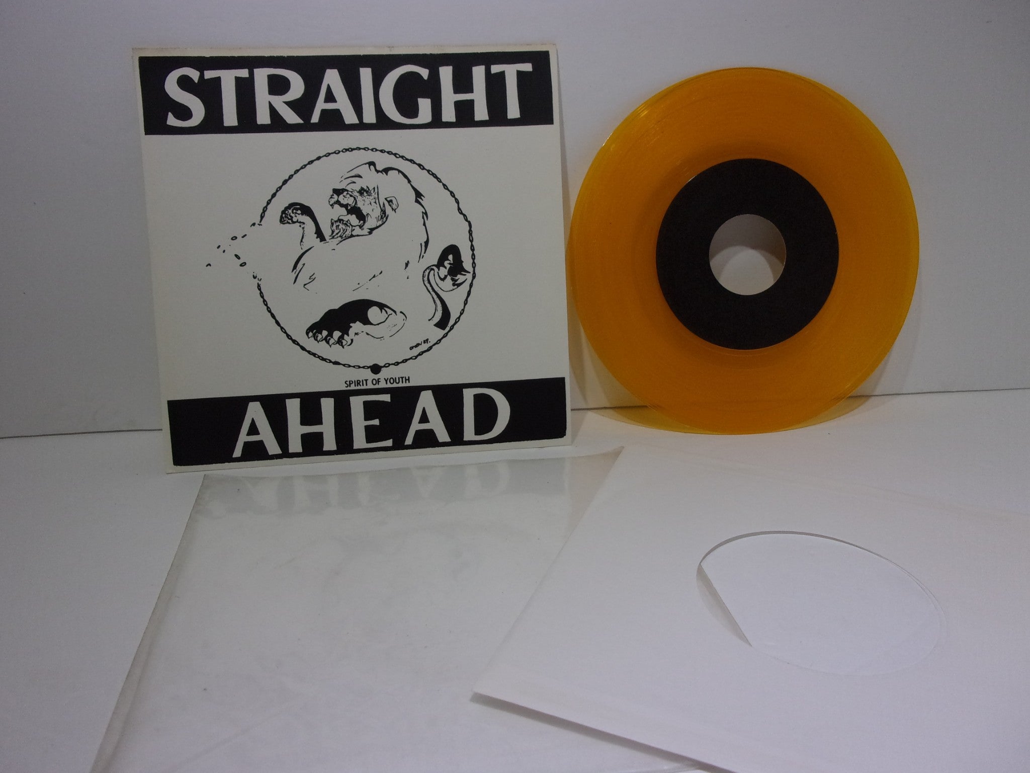 Straight Ahead: Spirit Of Youth EP with yellow vinyl and cover art. Highlighting the band's logo and design, suitable for collectors.