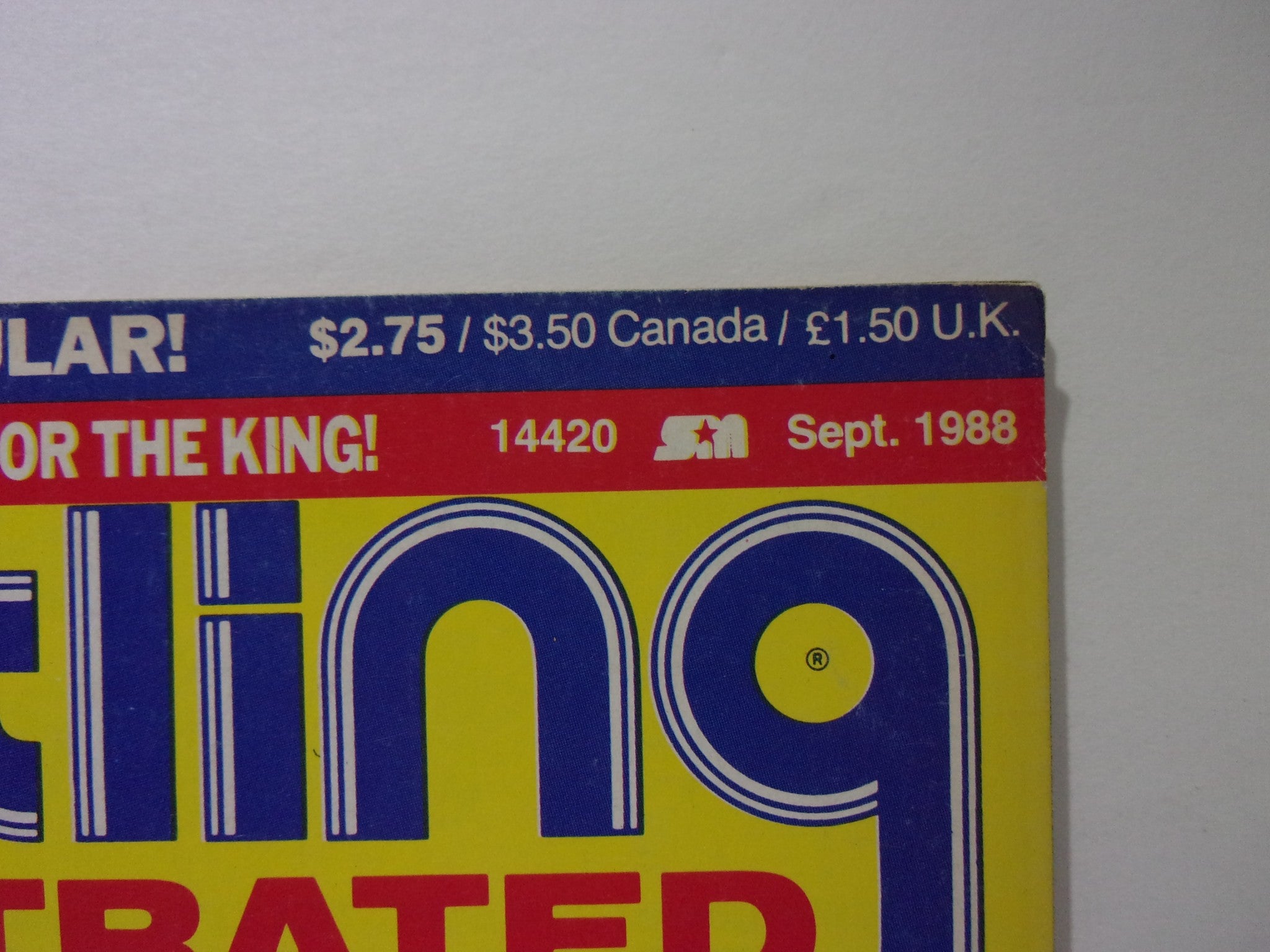 Detail of the top header from the Pro Wrestling Illustrated September 1988 magazine, featuring price information and month/year. Highlights the magazine's release as a collectible item.
