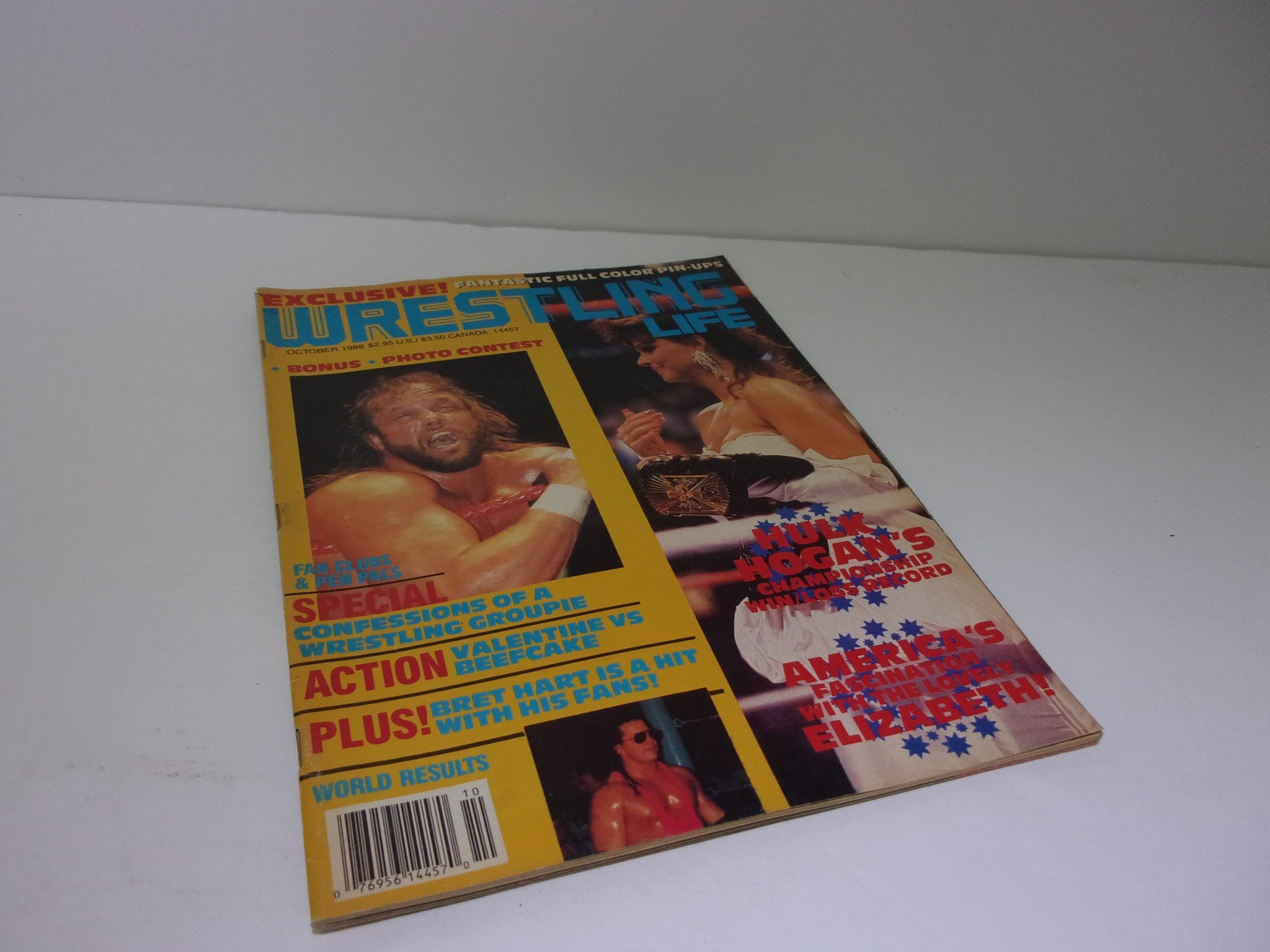 Wrestling Life Magazine October 1988 cover showcasing Randy Savage and Elizabeth, featuring enticing headlines about wrestling matches and exclusive contests.
