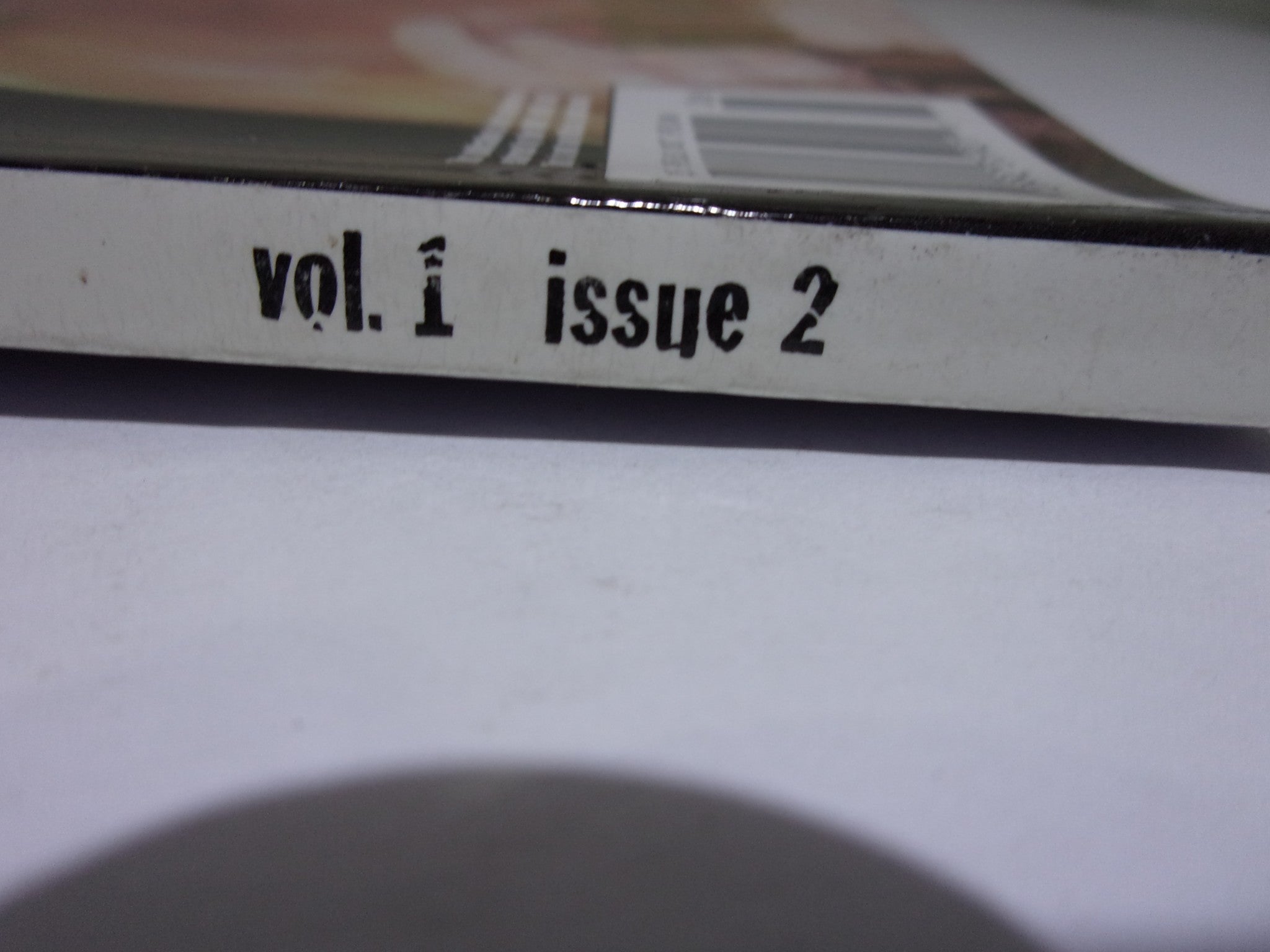 Side view image of Wow Magazine: The Best of WCW - ECW - WWF June 1999 Vol. 1 Issue 2 highlighting the volume and issue number, Vol. 1 Issue 2.