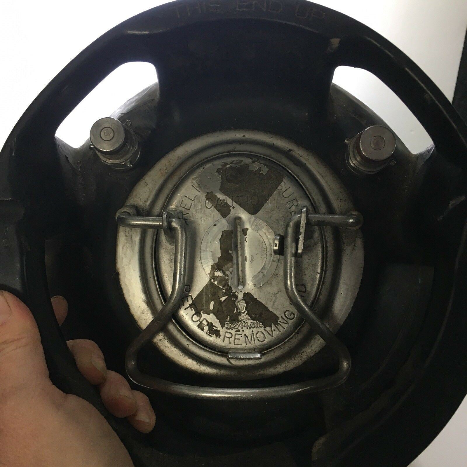 Inside view of the Vintage COCA COLA Keg Syrup 5 Gallon showing the cap and fittings, valuable for collectors.