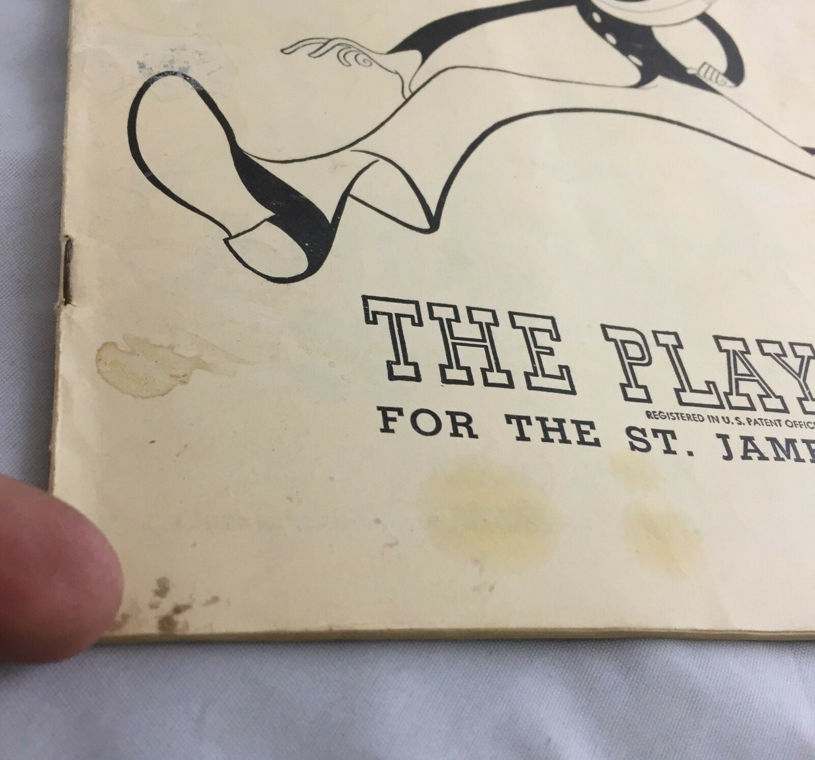 Close-up view of Vintage June 1949 Broadway Theatre Playbill 'Where's Charley?' showing edge wear and stains, highlighting its authentic vintage condition.