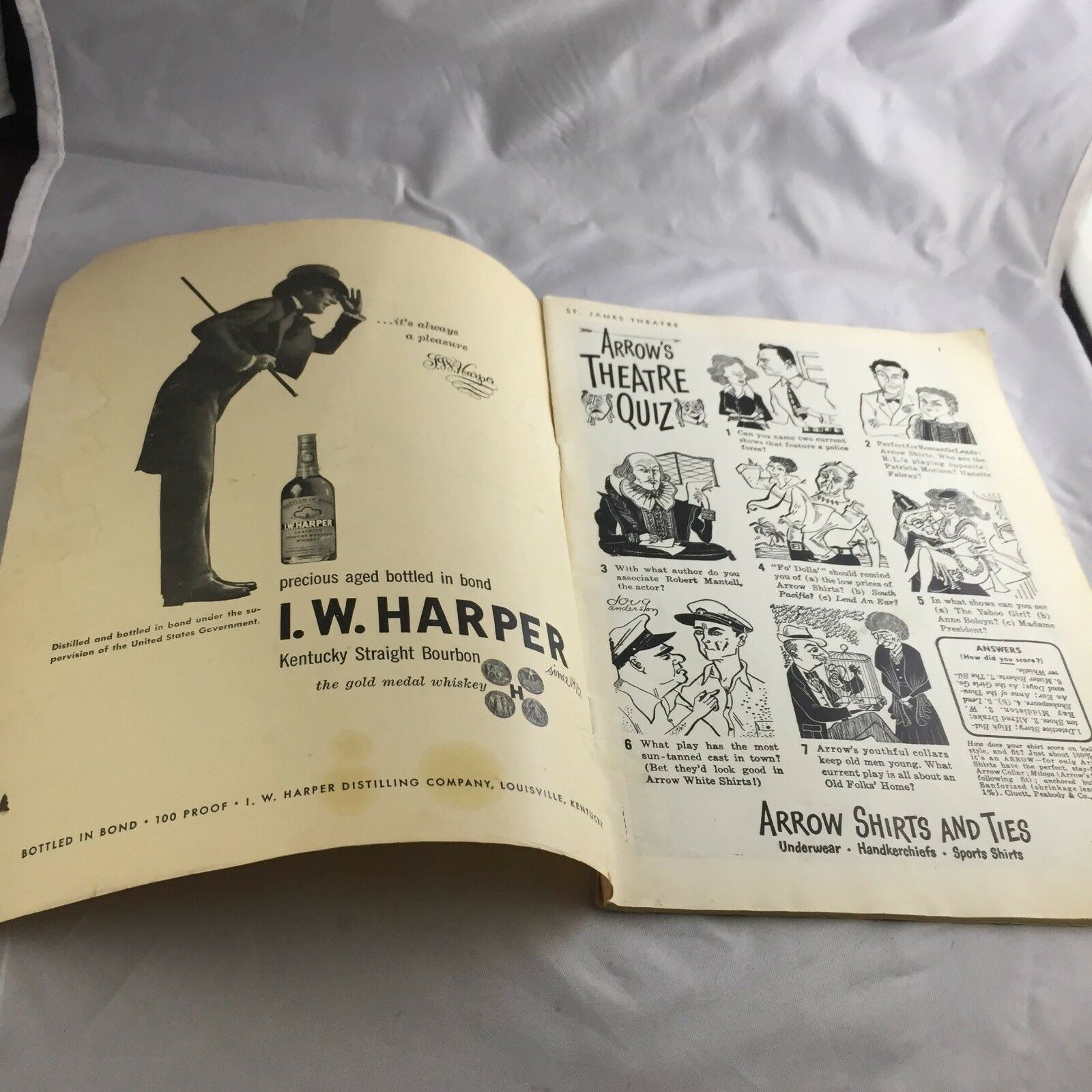 Inside pages of the Vintage June 1949 Broadway Theatre Playbill 'Where's Charley?' displaying an ad for I.W. Harper Bourbon and a theatre quiz, reflecting the entertainment culture of the time.