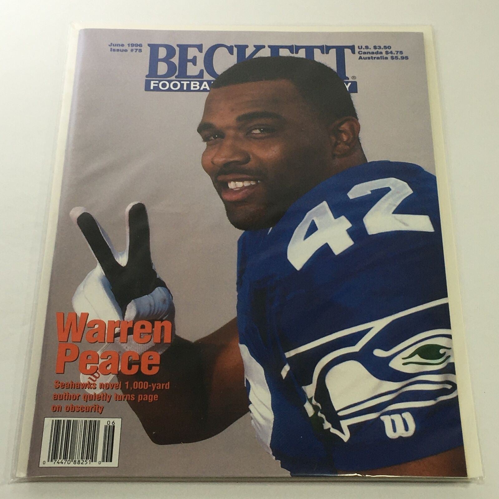 Beckett Football Card Monthly: June 1996 Issue #75 - Seahawks Warren Peace