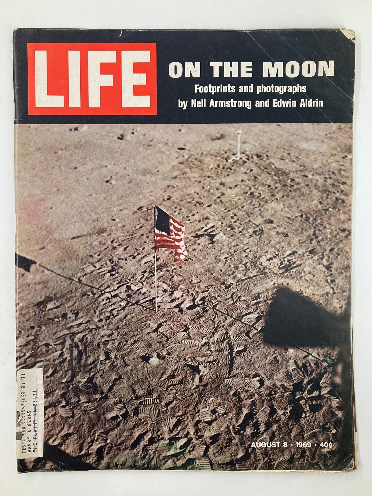VTG Life Magazine August 8 1969 cover featuring the moon landing, showing footprints on lunar surface and American flag, with text 'LIFE ON THE MOON Footprints and photographs by Neil Armstrong and Edwin Aldrin'.