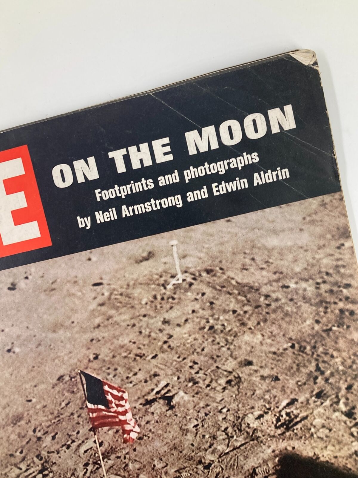Cover of VTG Life Magazine August 8 1969 featuring footprints on the moon and an American flag, capturing the essence of the Apollo 11 mission.
