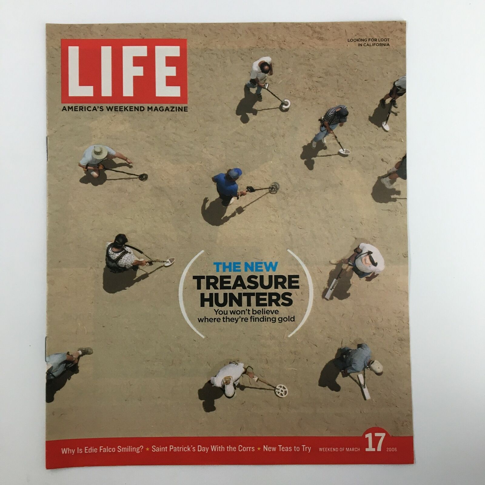 Cover image of Life Magazine Newspaper Insert titled 'The New Treasure Hunter,' dated March 17, 2006, showcasing people searching for treasure on a beach with metal detectors. This vintage publication features engaging visuals related to treasure hunting.