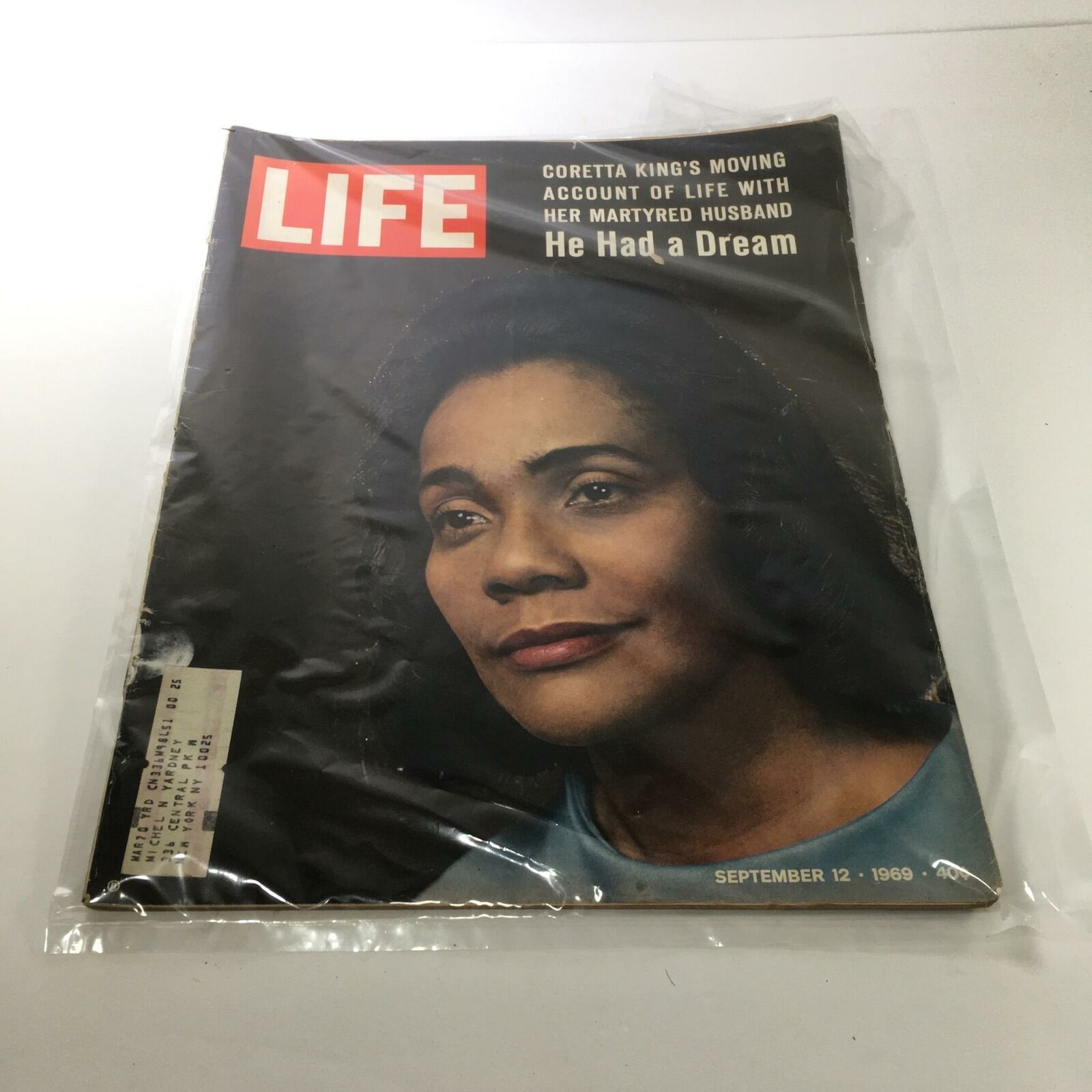 Cover of Life Magazine from September 12, 1969, featuring a portrait of Coretta King, highlighting her moving account of life with her martyred husband. The magazine is preserved in a plastic cover, showcasing its historical significance.