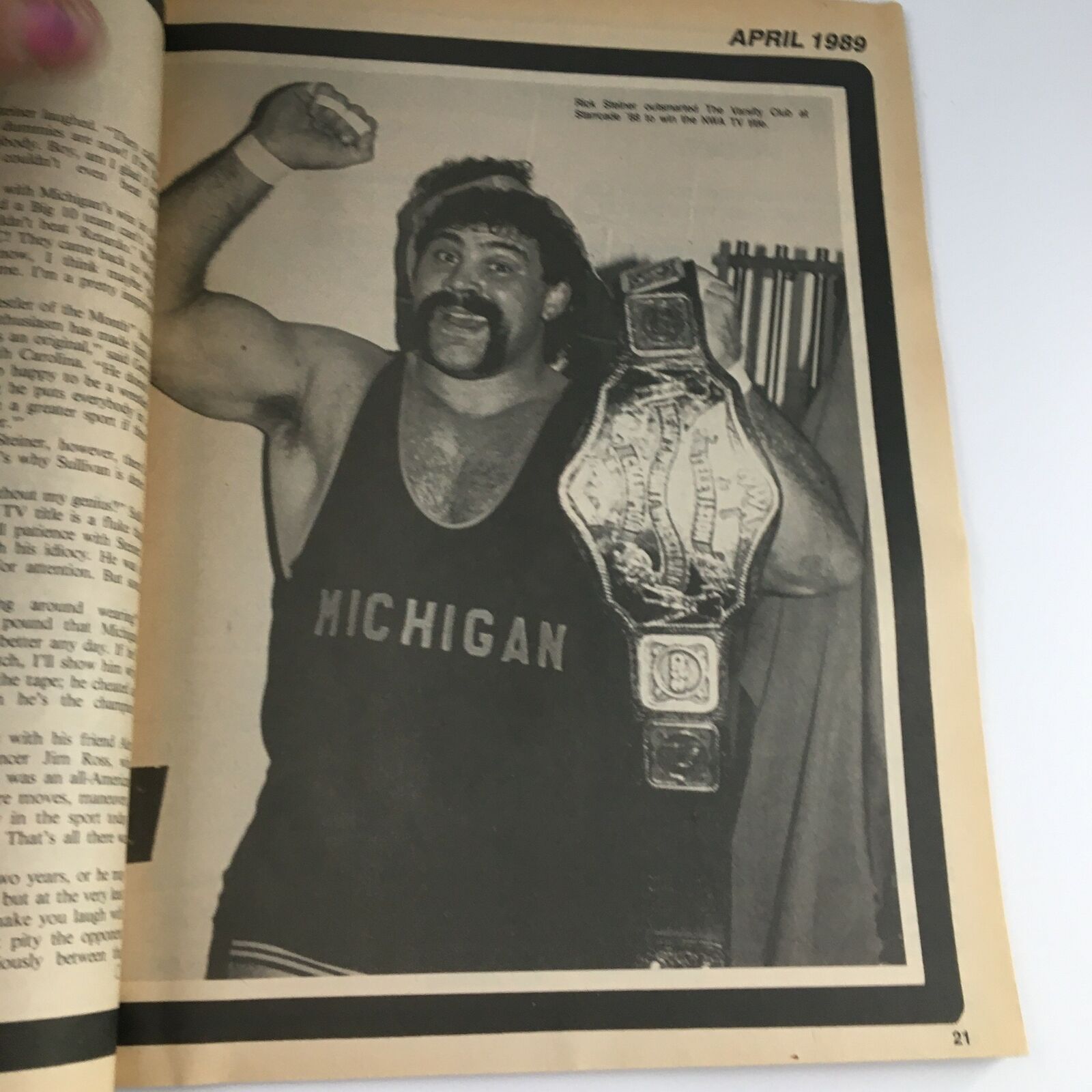 Action shot of a wrestler holding a championship belt in Sports Review Wrestling April 1989 magazine, featuring highlights from Lex Luger, Ric Flair, and Hulk Hogan.