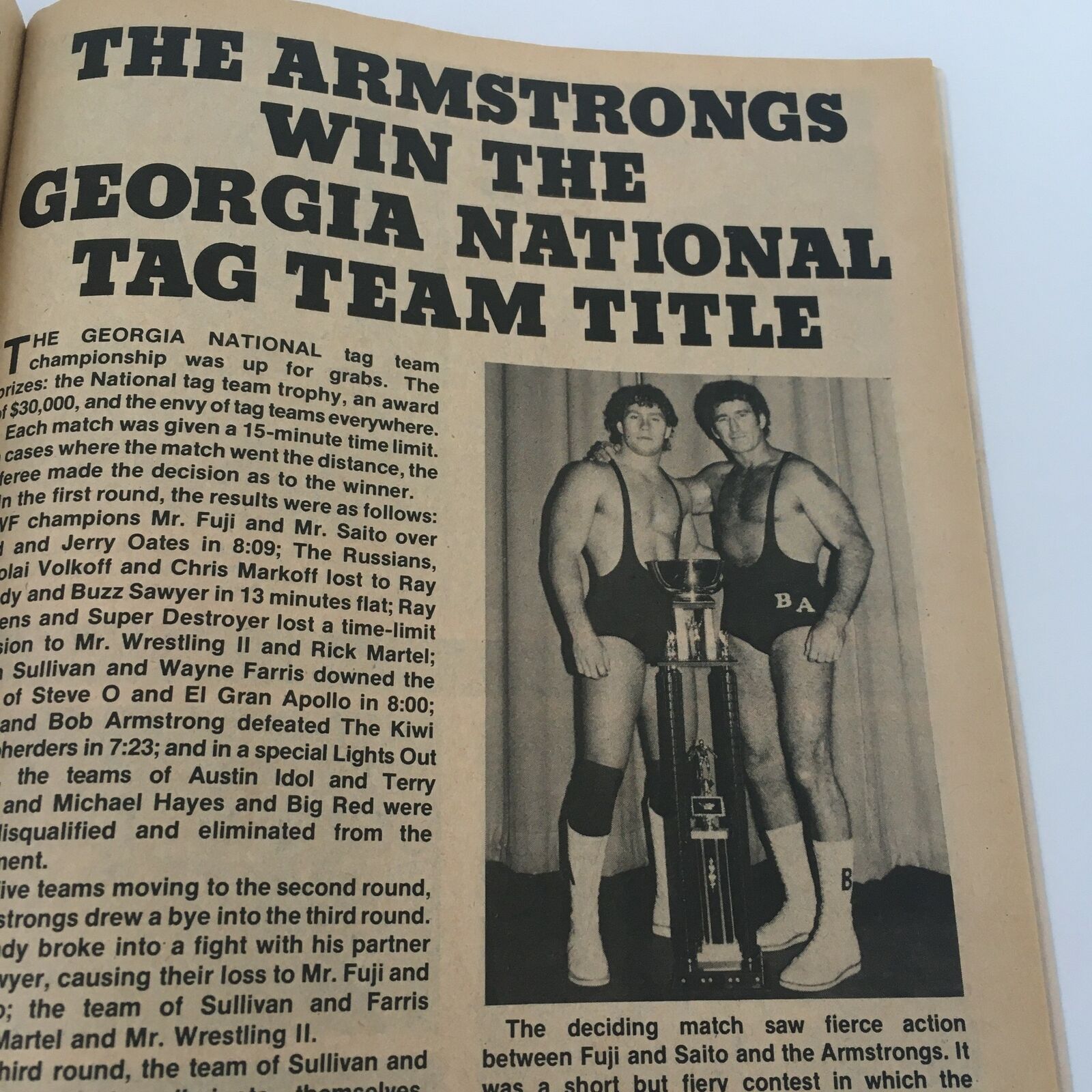 Article page from The Wrestler Magazine April 1982 about The Armstrongs winning the Georgia National Tag Team Title, featuring a photo of the champions.