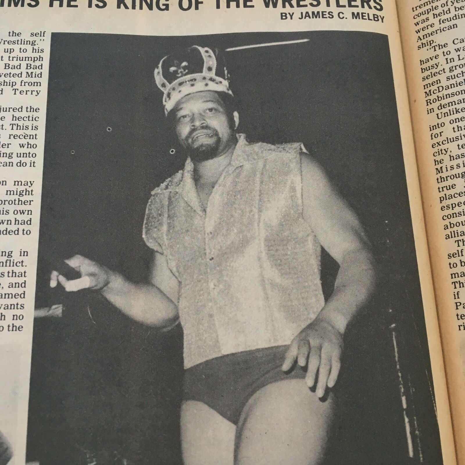 Black and white photo of a crowned wrestler from The Ring's Wrestling Magazine February 1981, highlighting his claims of being the king of the wrestlers.