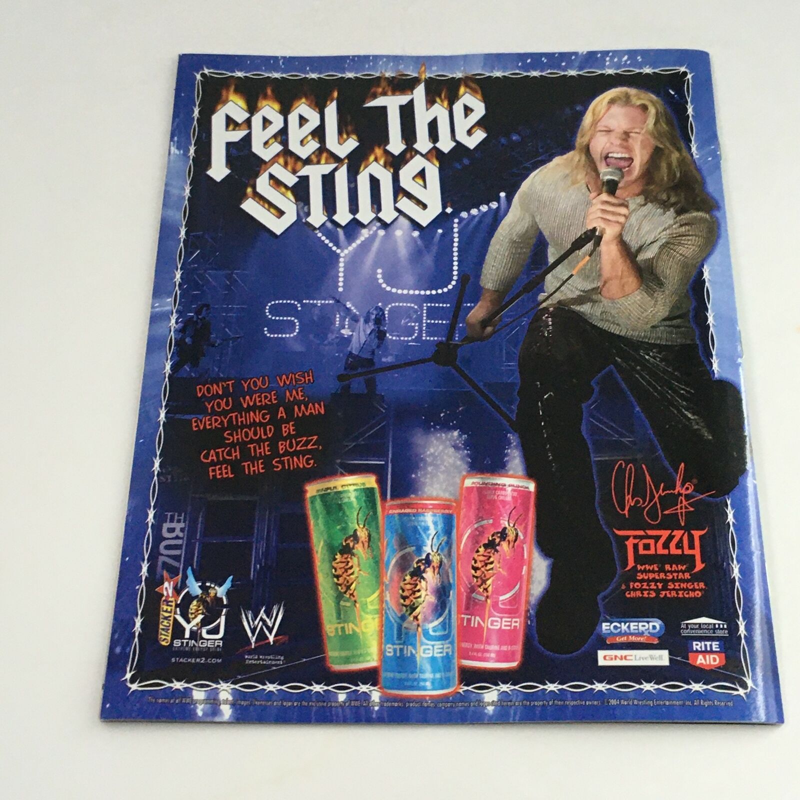 WWE Raw Magazine June 2004 promotional page, featuring Edge and a product advertisement for Sting energy drink.