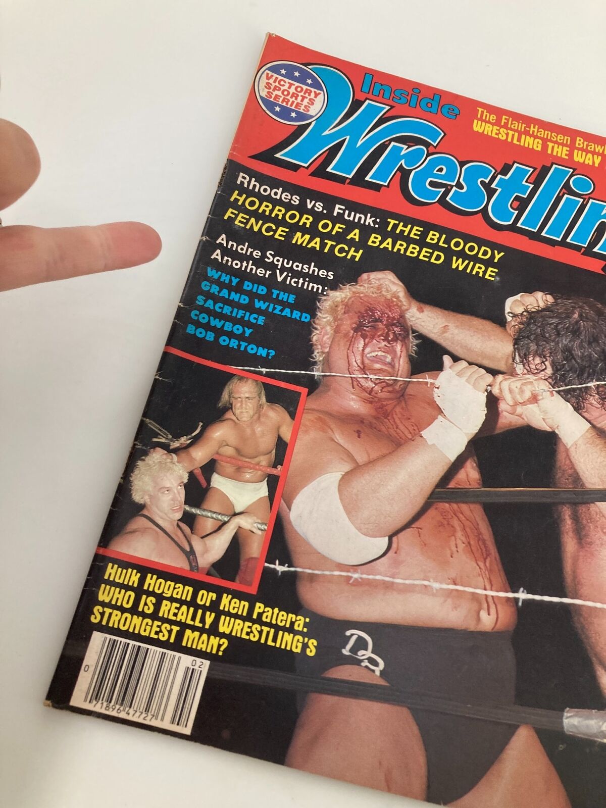 Close-up view of the February 1983 Inside Wrestling Magazine cover, prominently displaying Hulk Hogan vs Ken Patera and featuring other wrestling match highlights.