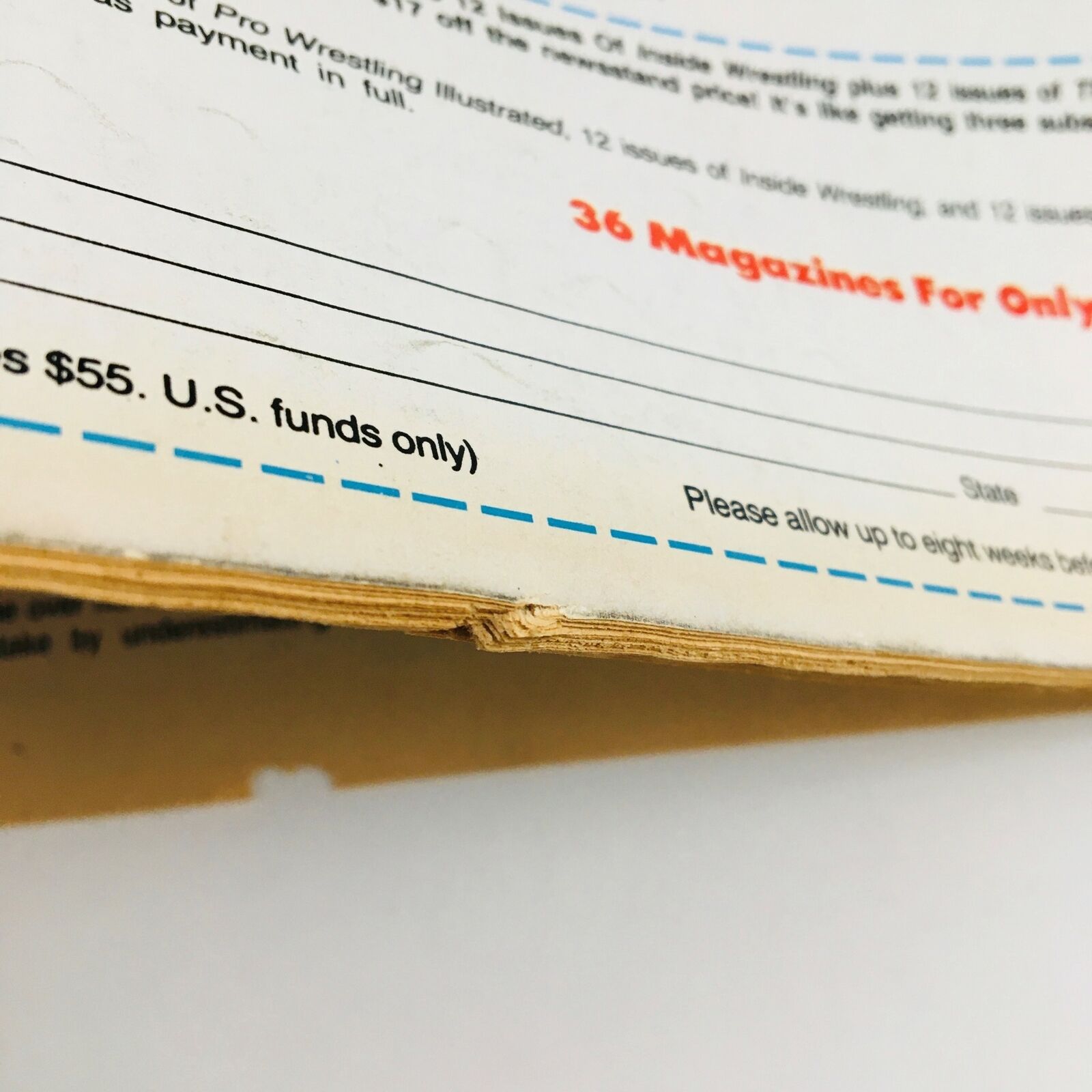 Close-up of subscription details from the Sports Review Wrestling Magazine February 1985, indicating prices and magazines offered for wrestling fans.