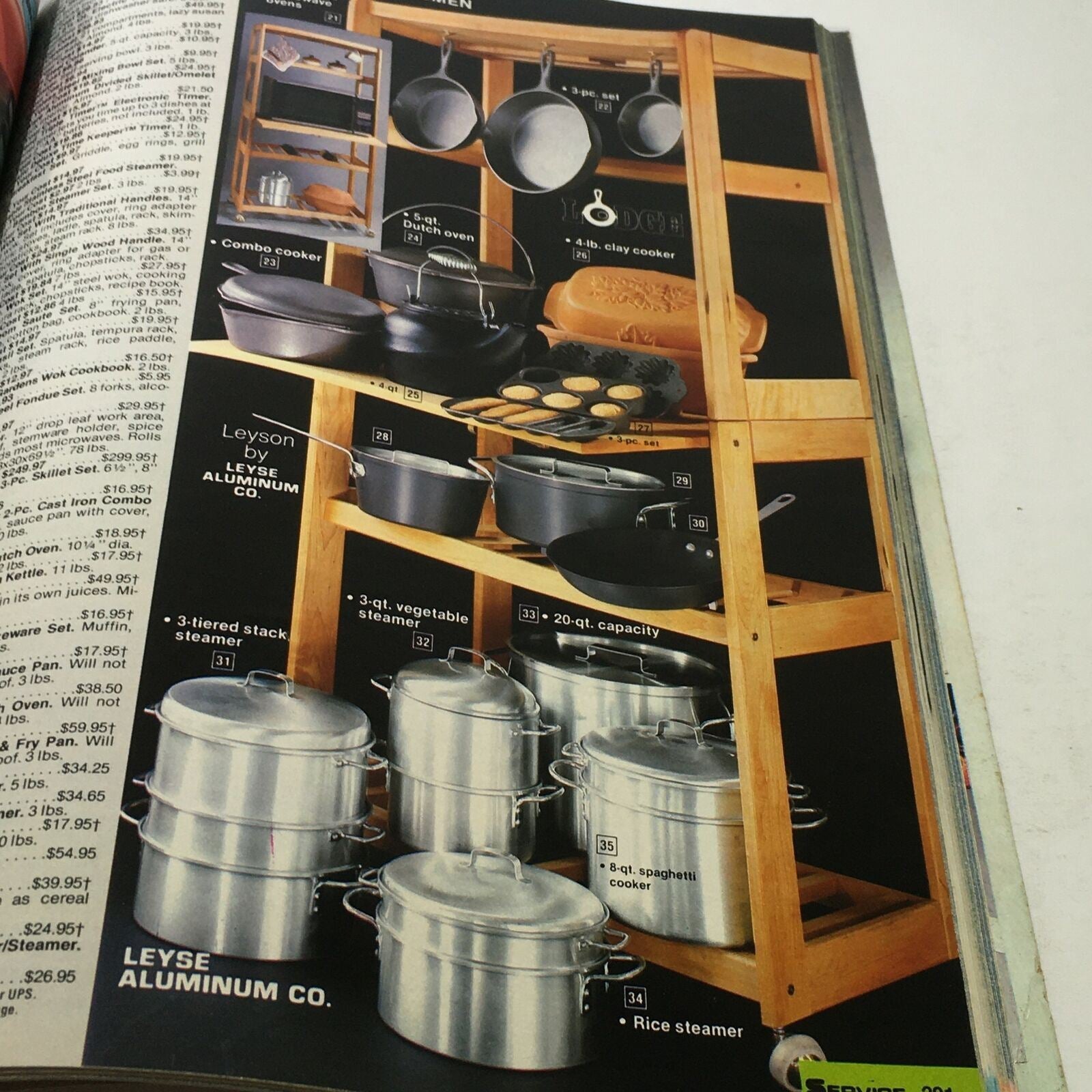 VTG Service Merchandise Catalog Showroom 1983-1984 Volume 14 displaying an array of cookware products from Leyse Aluminum Co., including various pots and steamers. The image features product details and pricing for kitchen essentials.