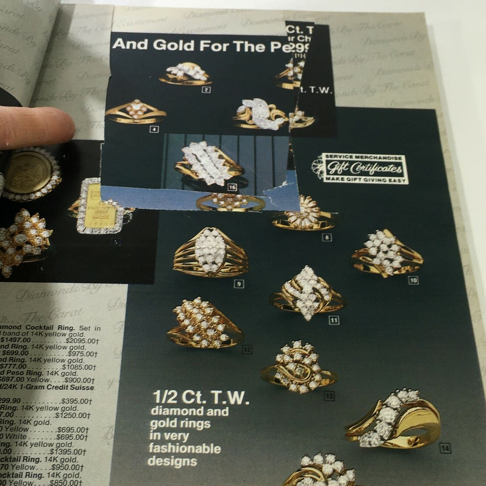 Interior page of the VTG Service Merchandise Catalog Showroom 1983-1984 Volume 14 displaying diamond and gold rings with cut-outs visible.