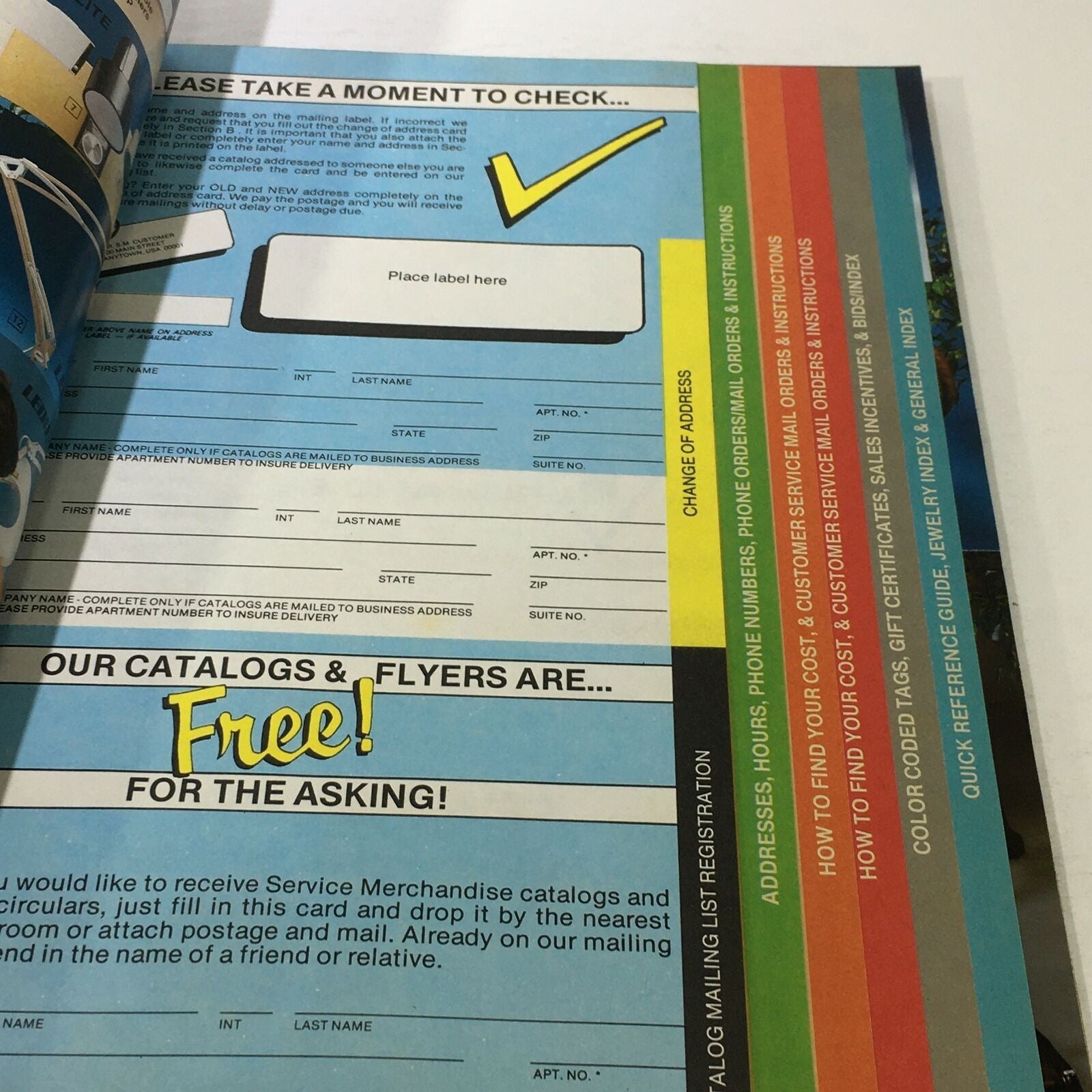 VTG Service Merchandise Catalog Showroom 1983-1984 Volume 14 with a page featuring a customer address confirmation and registration form. The form outlines how to receive catalogs and flyers, emphasizing that they are available for free.