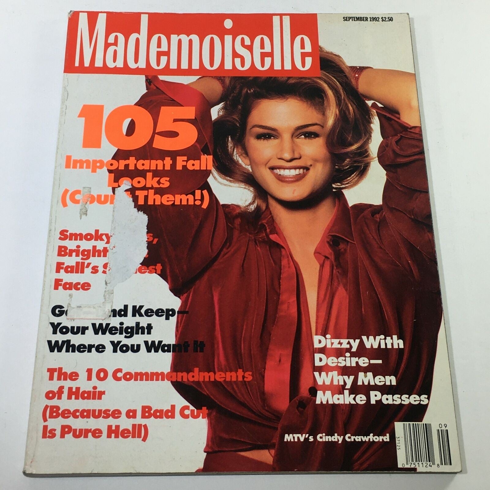 Cover of VTG Mademoiselle Magazine from September 1992 featuring a striking model styled in fall fashion, titled '105 Important Fall Looks.' Highlights include vibrant text along with a promotion for articles on hair and men's attraction.