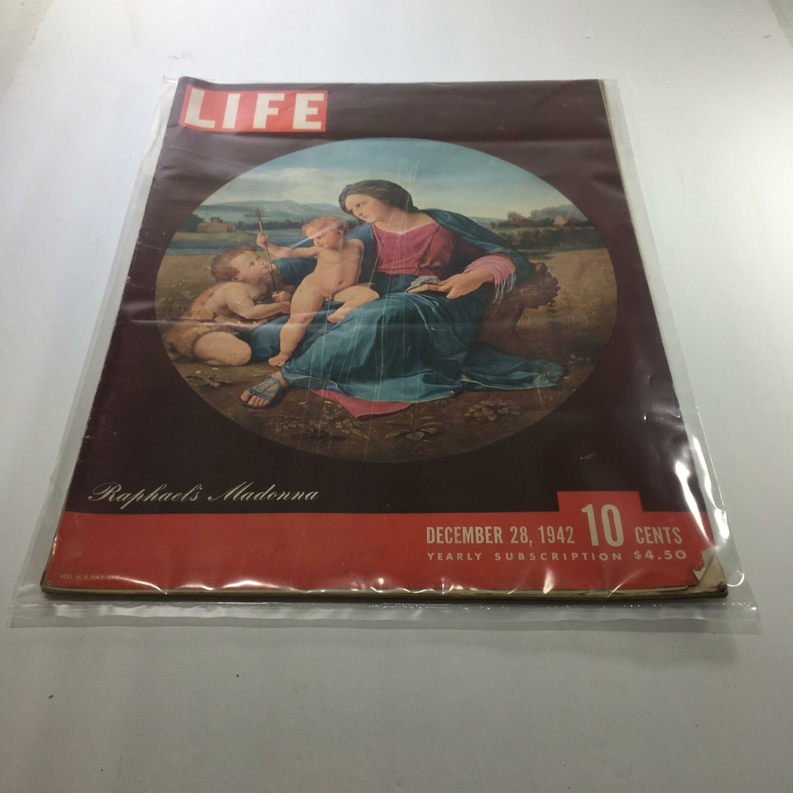 VTG Life Magazine cover from December 28, 1942, featuring Raphael's Madonna artwork, showcasing historical significance and vintage aesthetic, perfect for collectors.