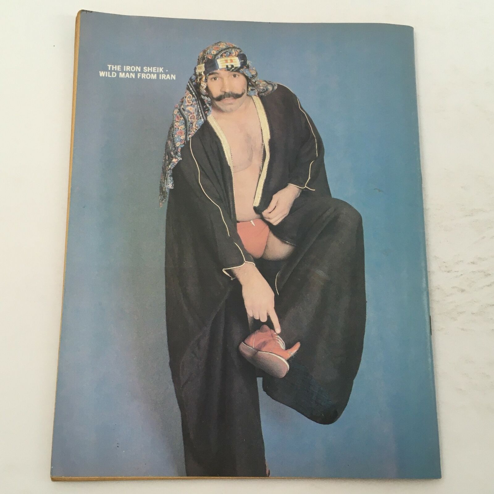 Cover of Wrestling Magazine #80, 1981 featuring The Iron Sheik in a traditional outfit, symbolizing the vibrant wrestling scene of its era.
