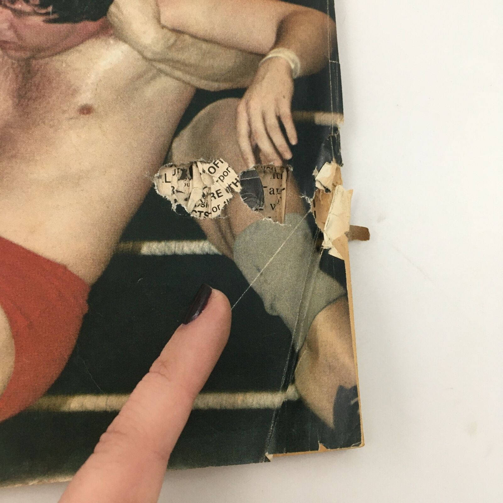 Detailed view of wear on the cover of Inside Wrestling Magazine September 1981, showing damage consistent with age. This adds to its character as a vintage collectible.