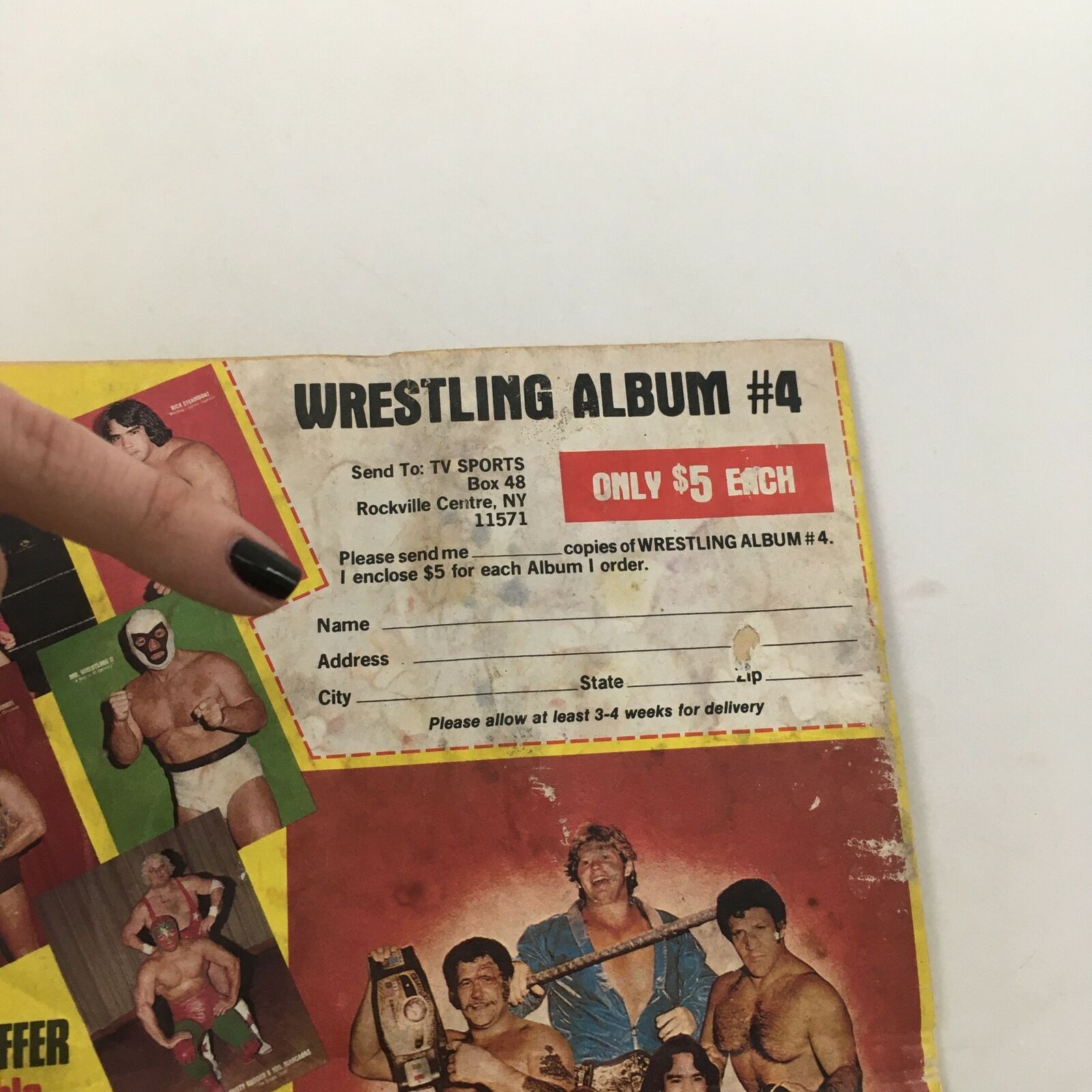 Wrestling Album #4 advertisement featuring a vintage wrestling catalog layout from October 1981, highlighting professional wrestling icons along with subscription details. The magazine cover is associated with The Wrestler Magazine, showcasing Dusty Rhodes who swears revenge on Killer Khan.