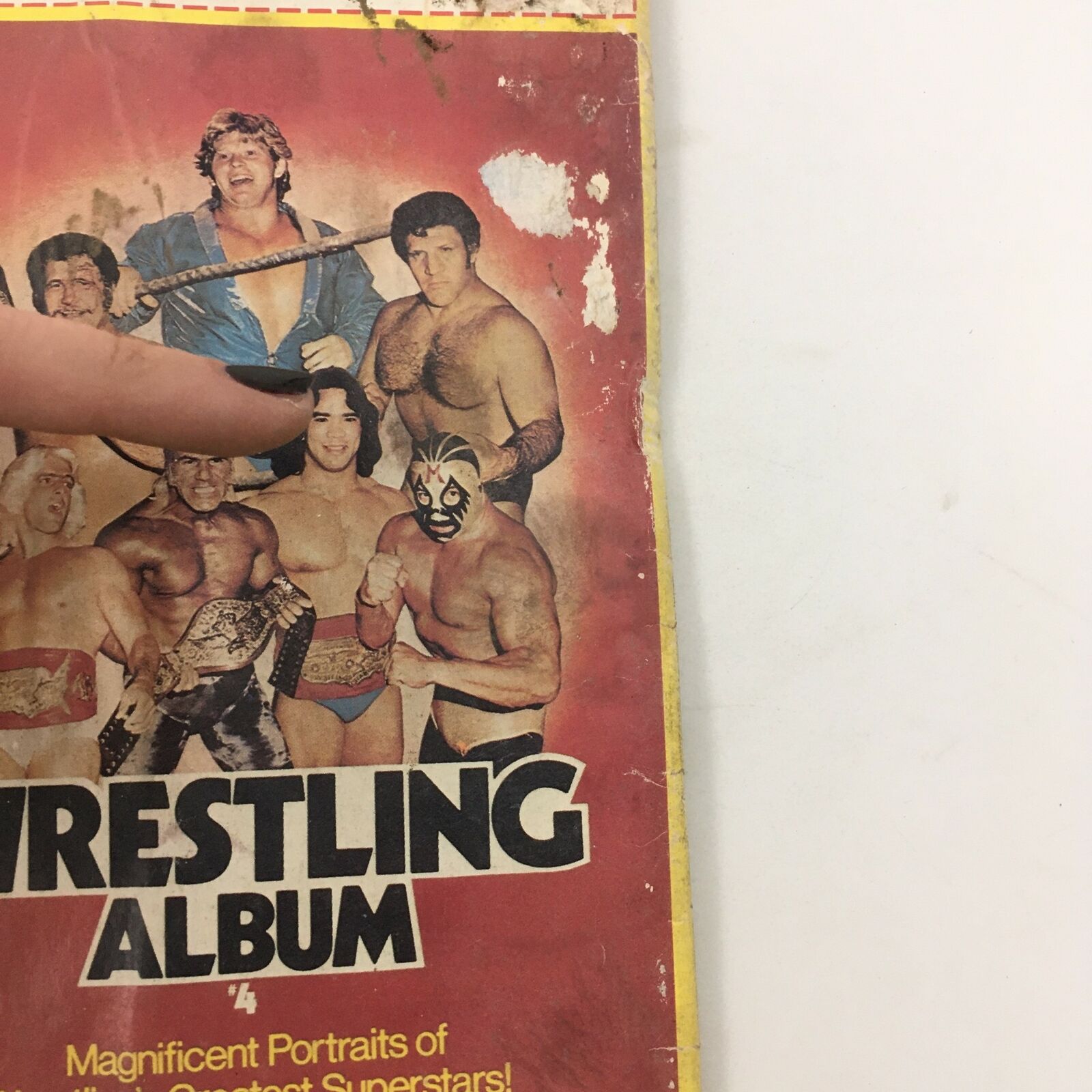 Close-up view of the back cover of The Wrestler Magazine April 1981 highlighting 'Wrestling Album #4', featuring portraits of wrestling superstars.