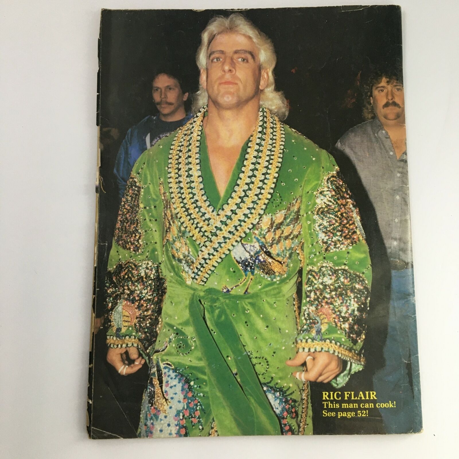 Cover of Superstar Wrestlers Magazine June 1988, issue #23 featuring Ric Flair in his iconic green robe, exuding charisma as a wrestling legend.