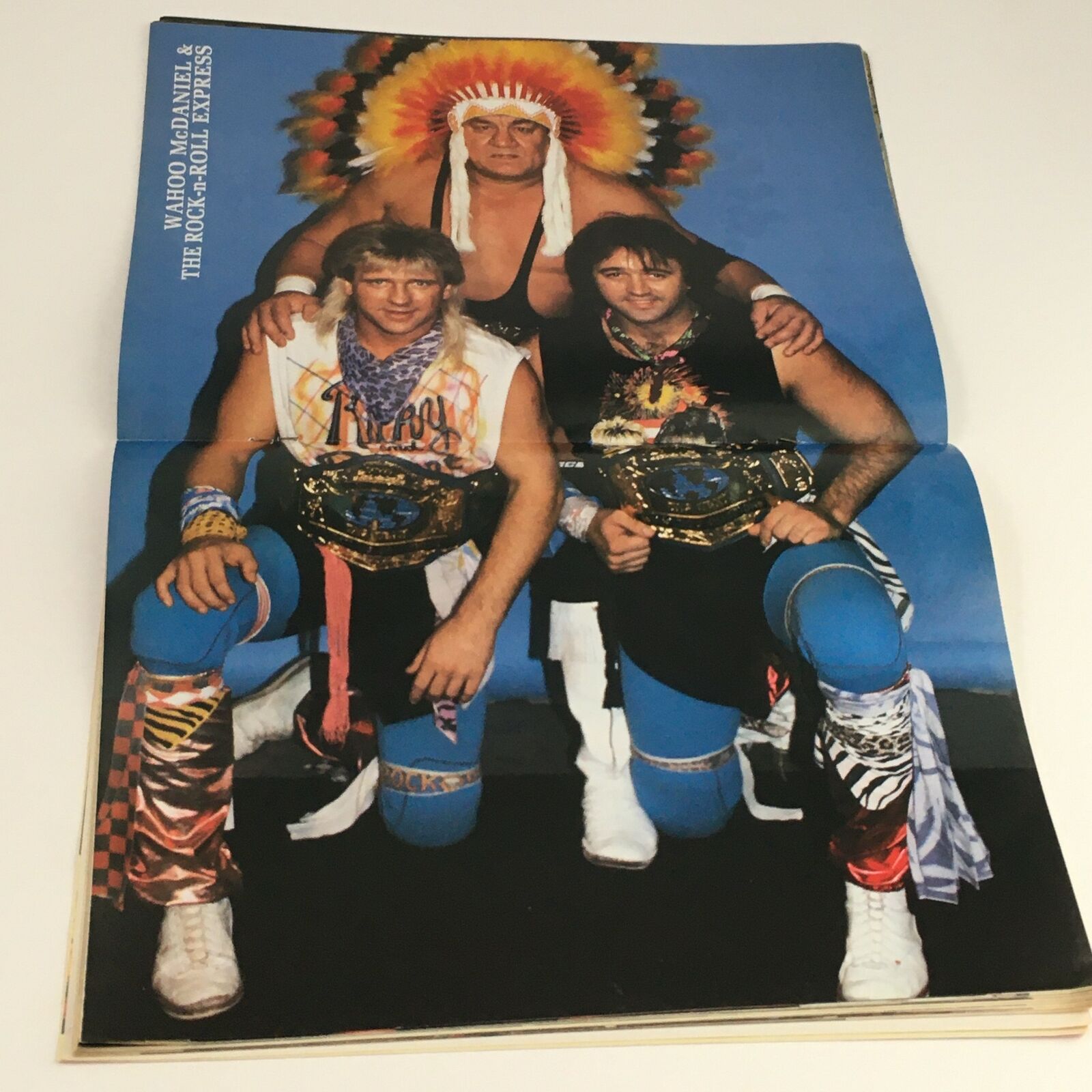 Inside poster from Superstar Wrestler Magazine April 1987 featuring Wahoo McDaniel and The Rock 'n' Roll Express with championship belts.