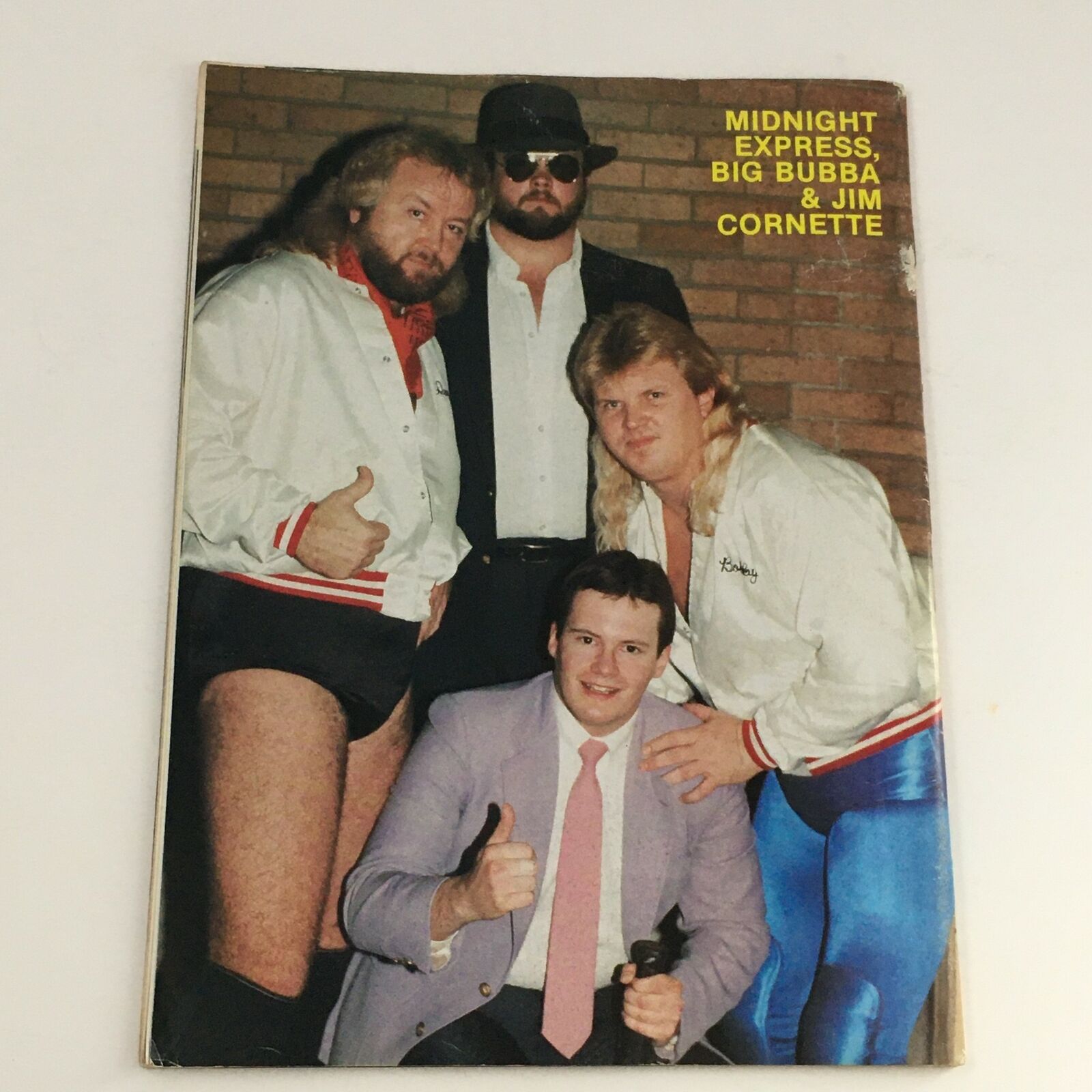 Image of Midnight Express, Big Bubba, and Jim Cornette from Superstar Wrestler Magazine April 1987, highlighting wrestling personalities.