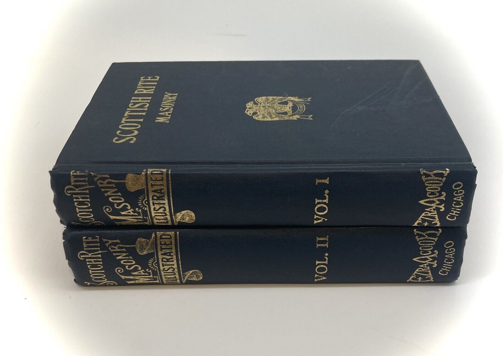 Scotch Rite Masonry Illustrated 1979 by Jonathan Blanchard, highlighting the spines of both volumes, with clear golden text and an elegant design.