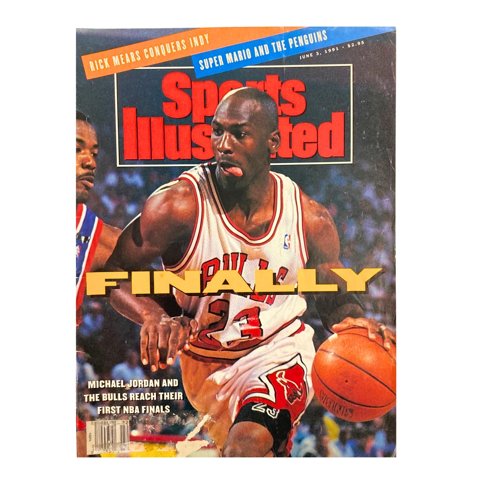 Cover of Sports Illustrated from June 3, 1991, showcasing Michael Jordan with the tag 'Finally.' This magazine is part of a vintage lot commemorating Michael Jordan's career with the Chicago Bulls.